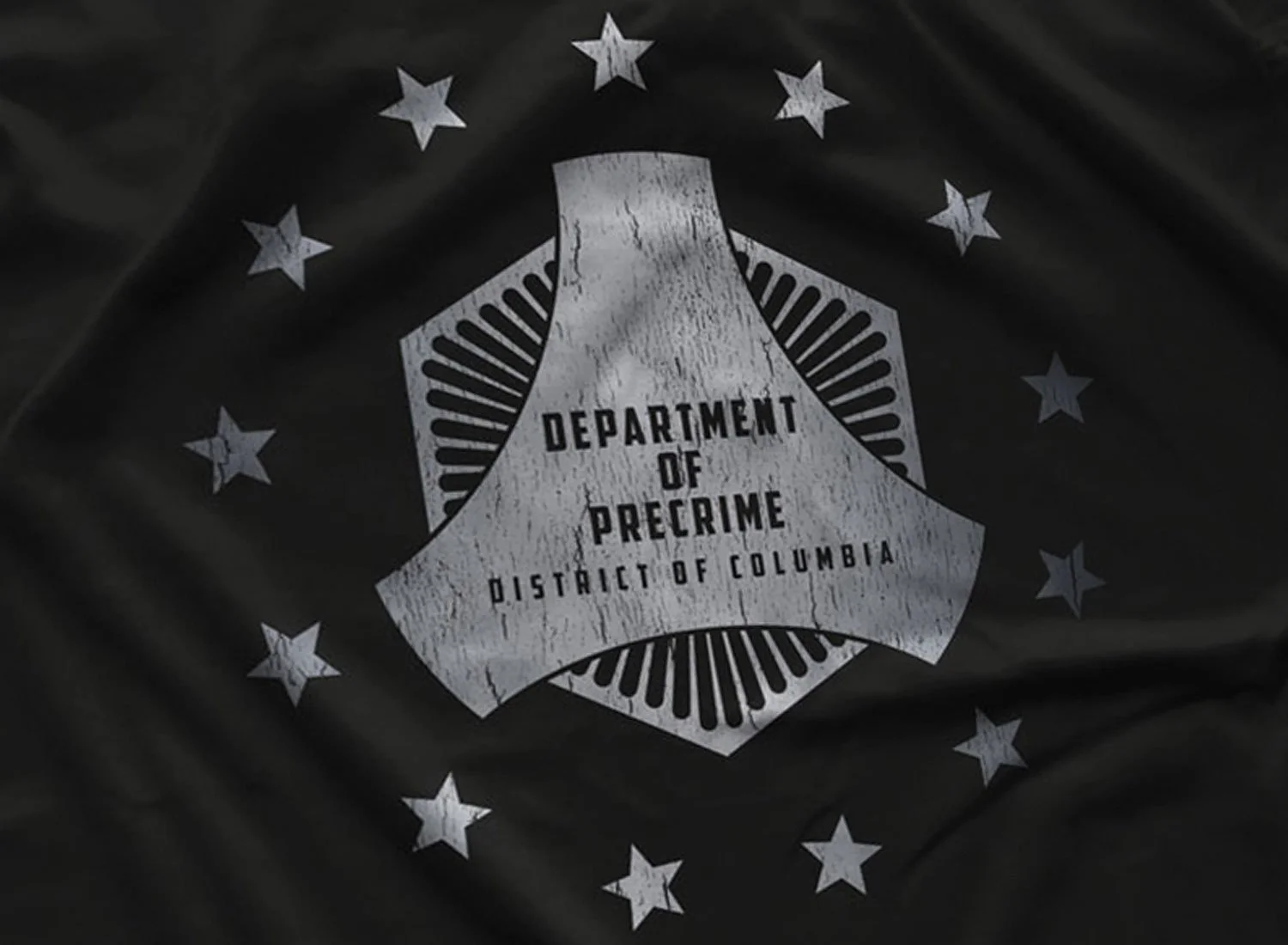Close-up of a Department of PreCrime T-Shirt in Black. Get your "Minority Report"-inspired shirt in sizes S to 5XL, starting at just $21.49 with free shipping.