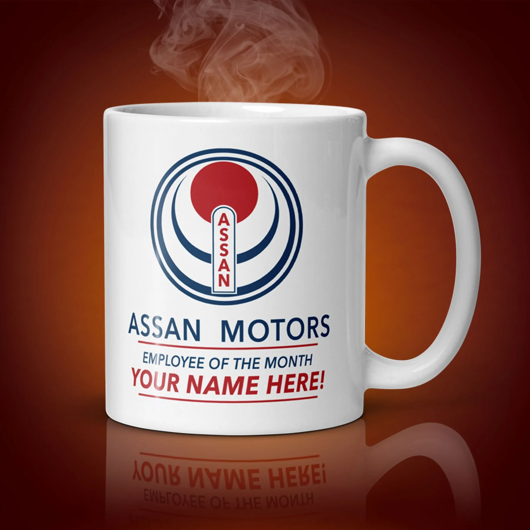 An 11-oz personalized Assan Motors Mug displays the left side. The artwork on our mug is inspired by the movie "Gung Ho". It is available for $24.99 with free shipping.