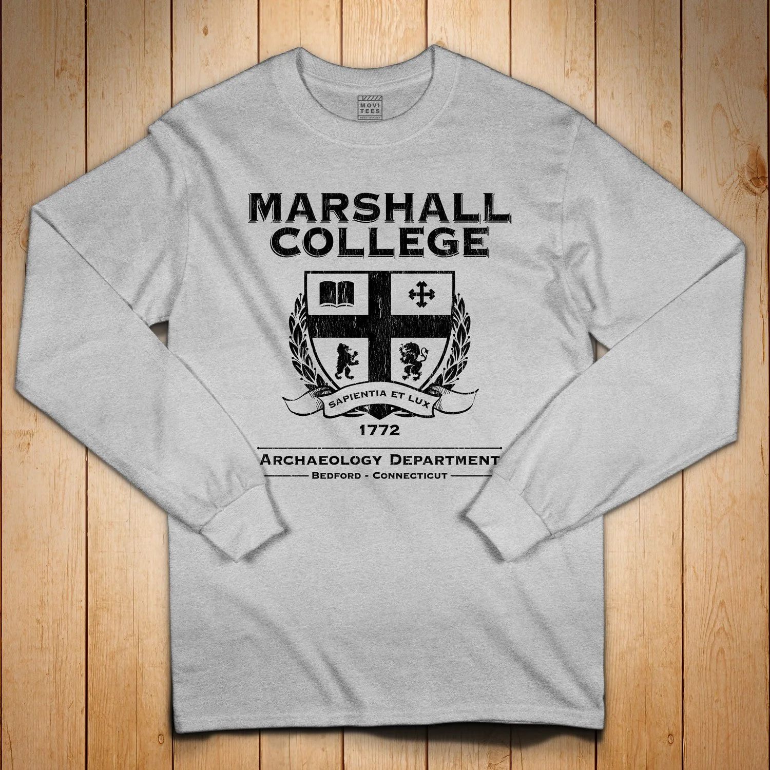 Marshall College Long Sleeve T-shirt in Sport Grey. Get your "Raiders of the Lost Ark"-inspired shirt in sizes S to 5XL, starting at just $27.99 with free shipping.