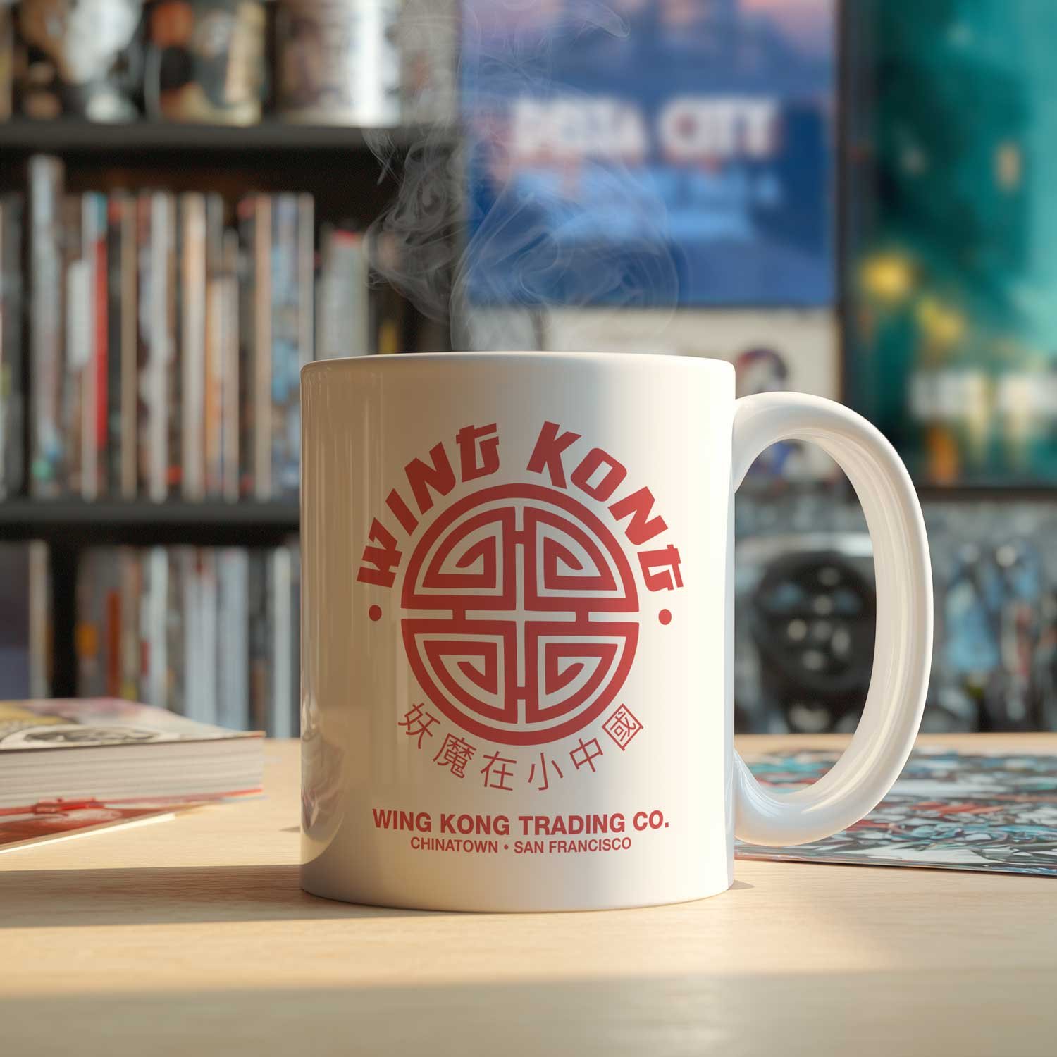 A Wing Kong Trading mug is displayed on a table, filled with coffee.
