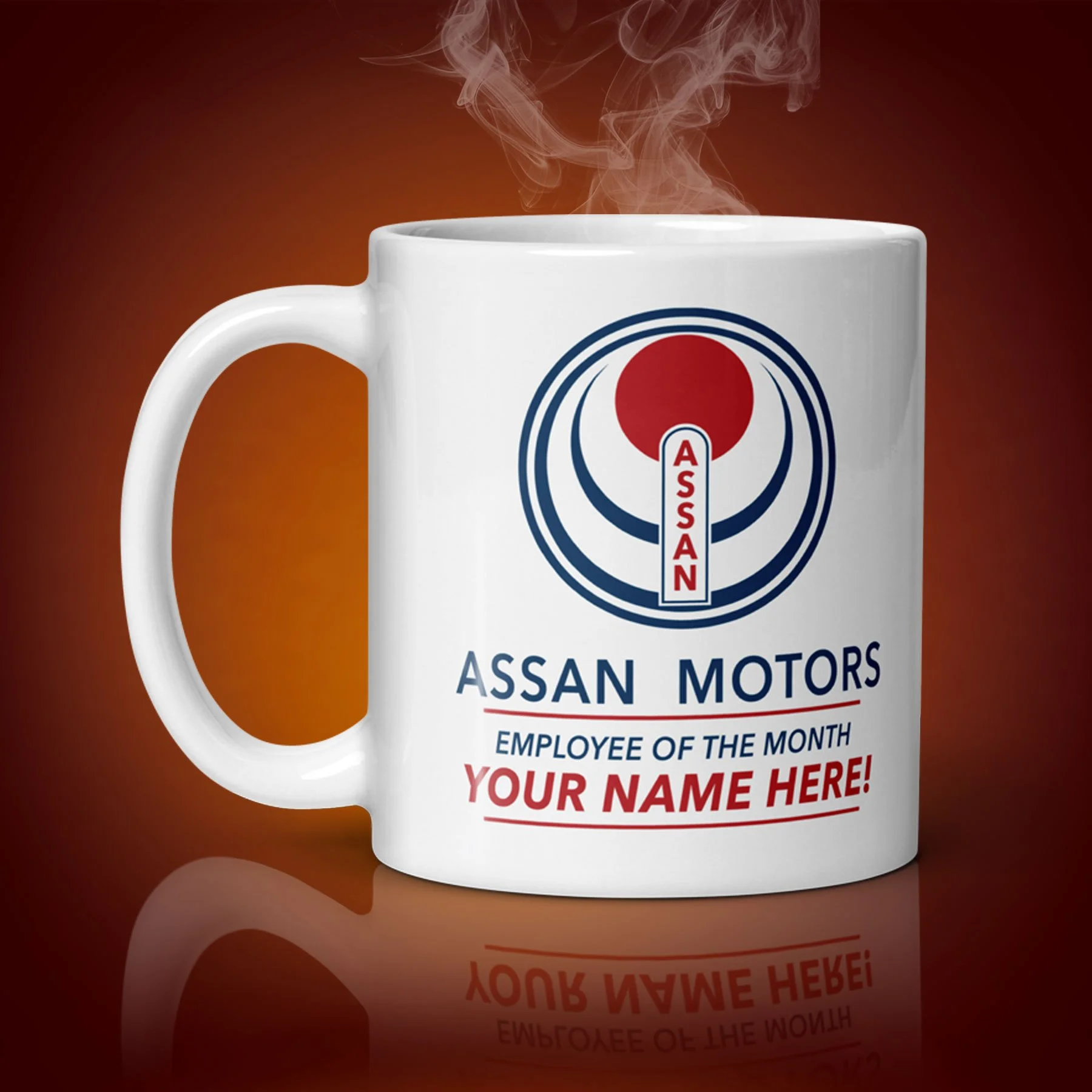An 11-oz personalized Assan Motors Mug displays the right side. The artwork on our mug is inspired by the movie "Gung Ho". It is available for $24.99 with free shipping.