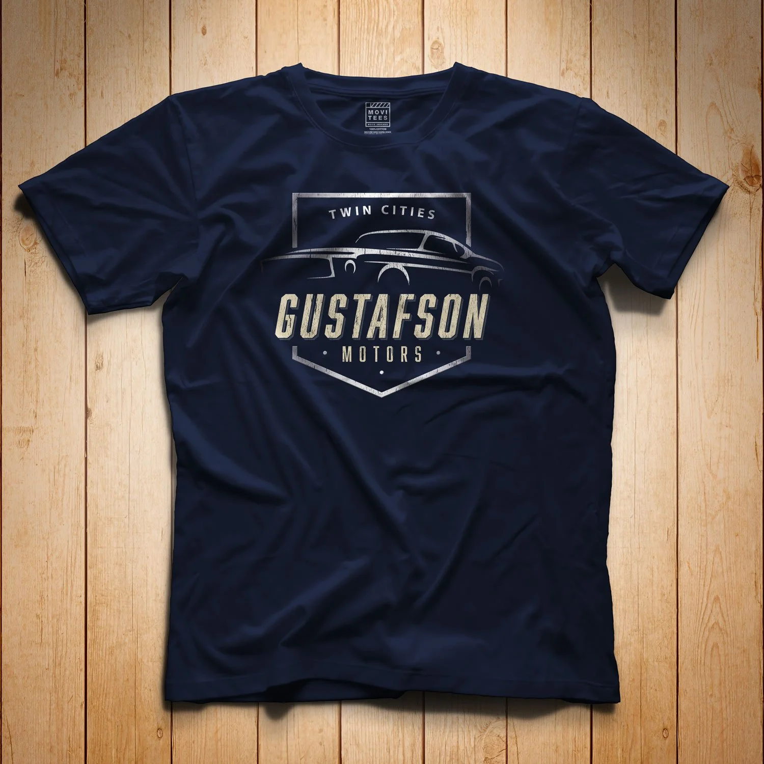 Gustafson Motors T-Shirt in Navy Blue. Get your “Fargo”- inspired shirt in sizes S to 5XL, starting at just $21.49 with free shipping.