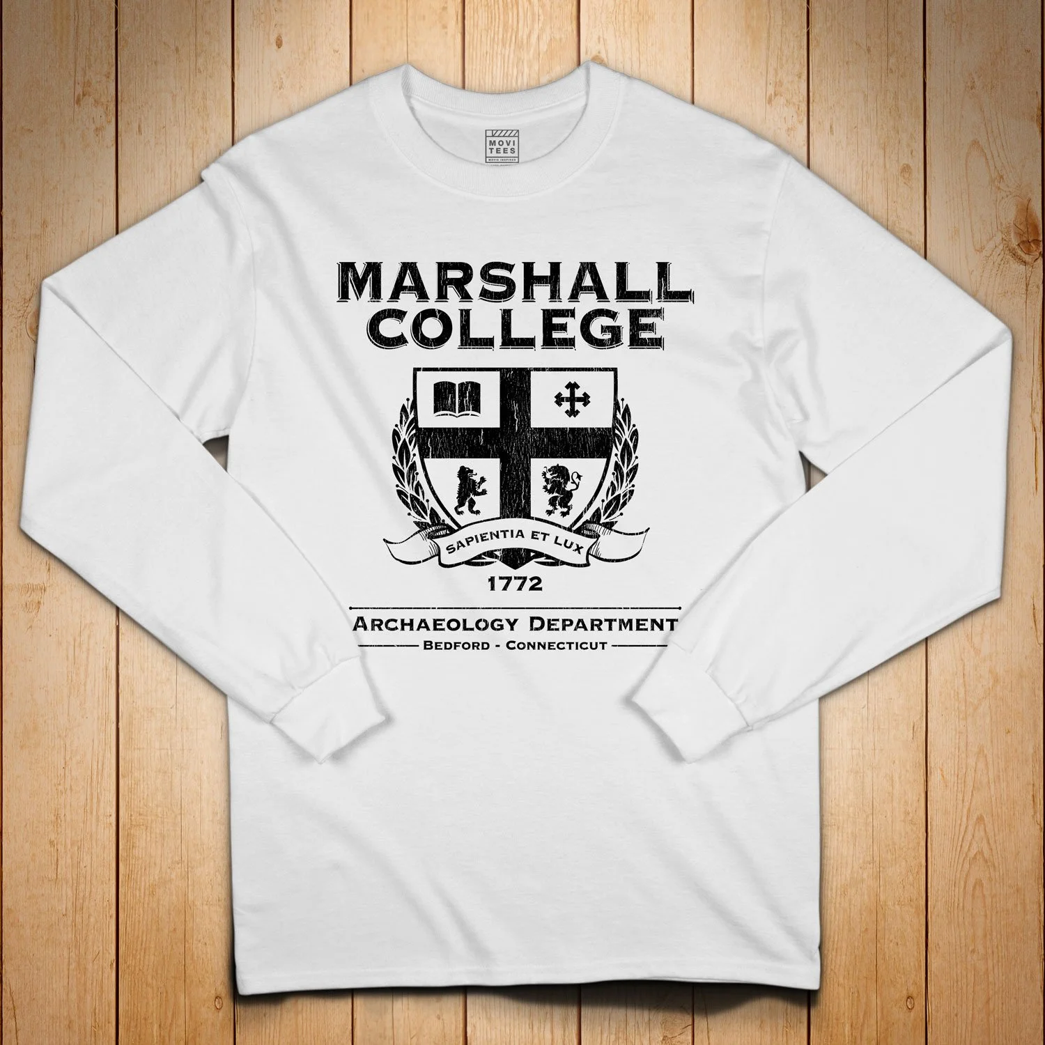 Marshall College Long Sleeve T-shirt in White. Get your "Raiders of the Lost Ark"-inspired shirt in sizes S to 5XL, starting at just $27.99 with free shipping.