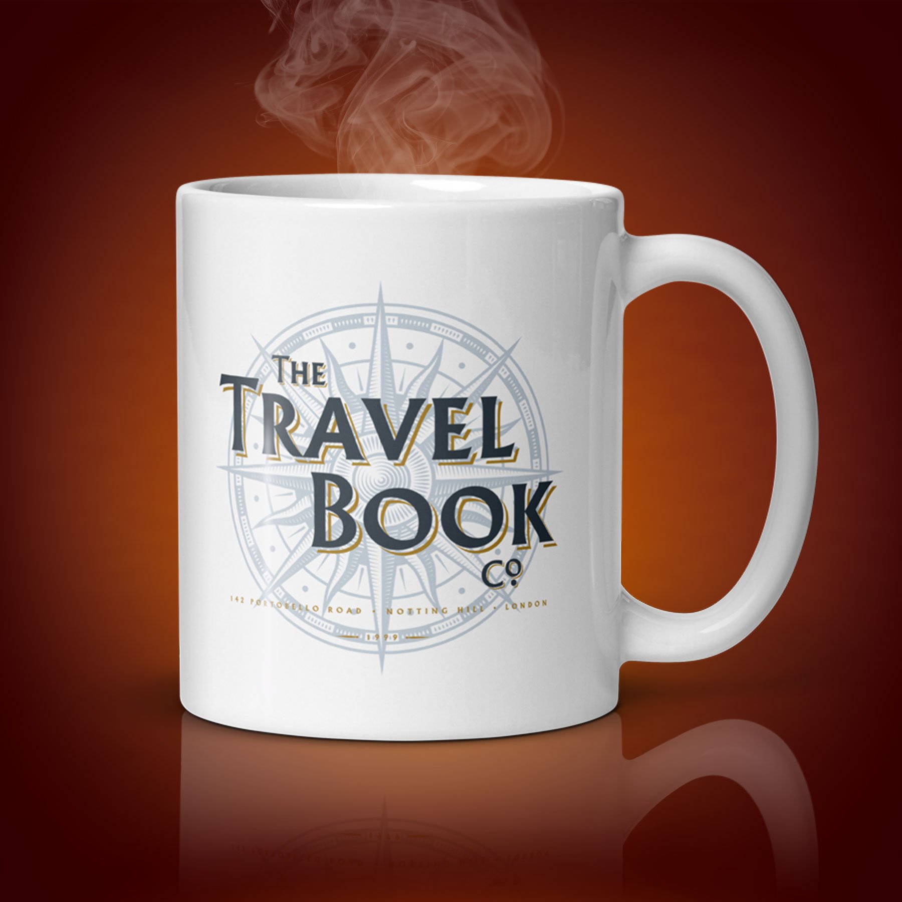 An 11-oz The Travel Book Co mug displays the left side. The artwork on our mug is inspired by the movie "Notting Hill". It is available for $21.99 with free shipping.