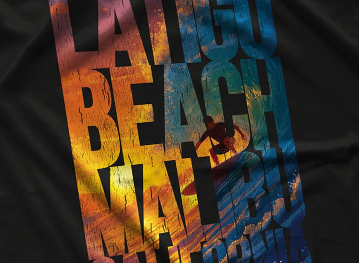 Close-up of a Latigo Beach T-Shirt in Black. Get your "Point Break"- inspired shirt in sizes S to 5XL, starting at just $21.49 with free shipping.