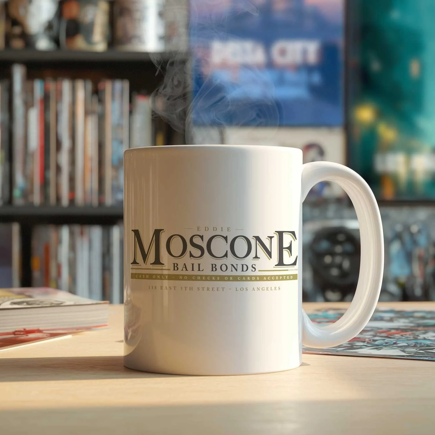 A Moscone Bail Bonds Mug is displayed on a table, filled with coffee.
