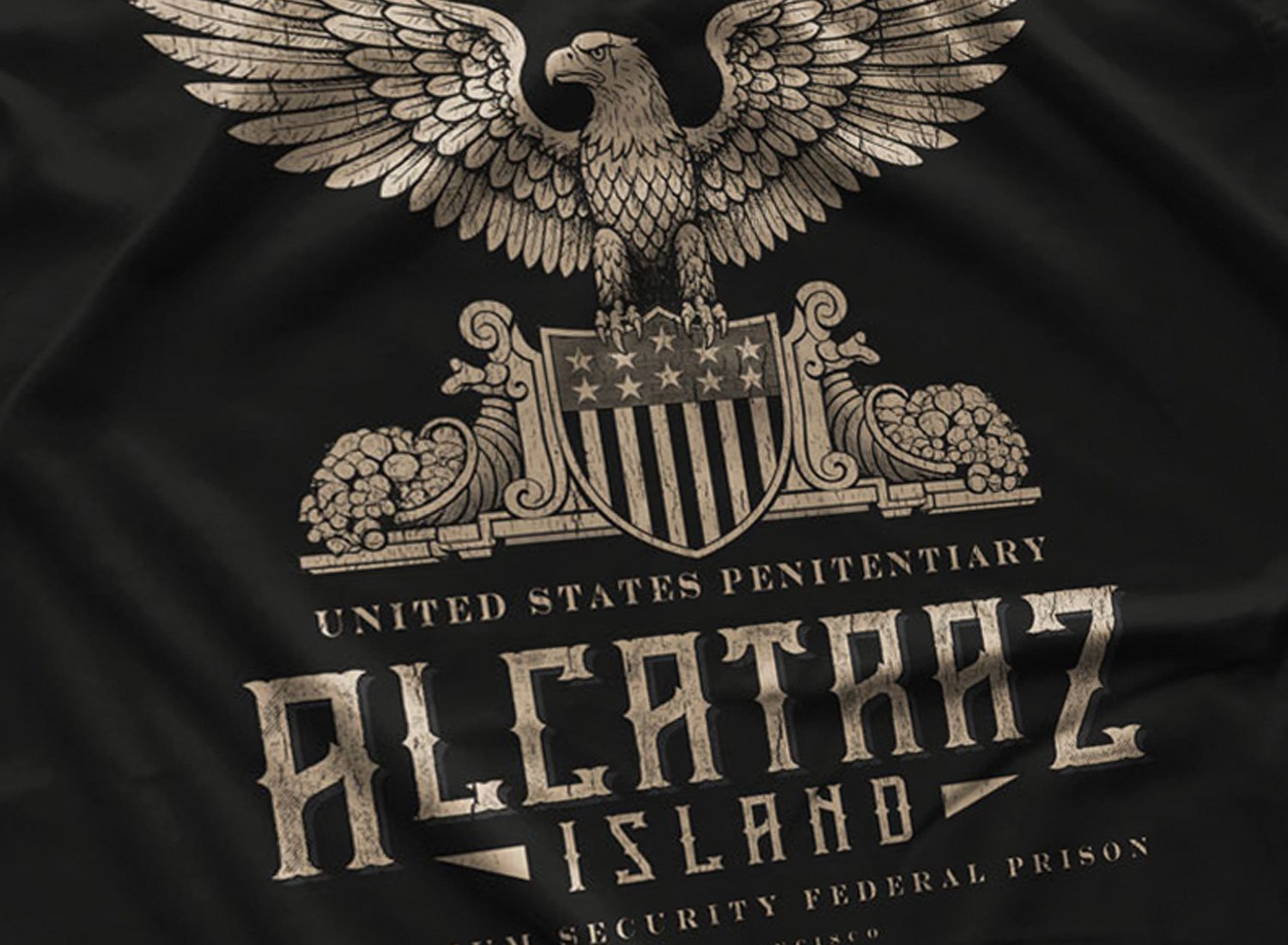 Close-up of a Alcatraz Island Prison T-Shirt in Black. Get your "The Rock"- inspired shirt in sizes S to 5XL, starting at just $21.49 with free shipping.