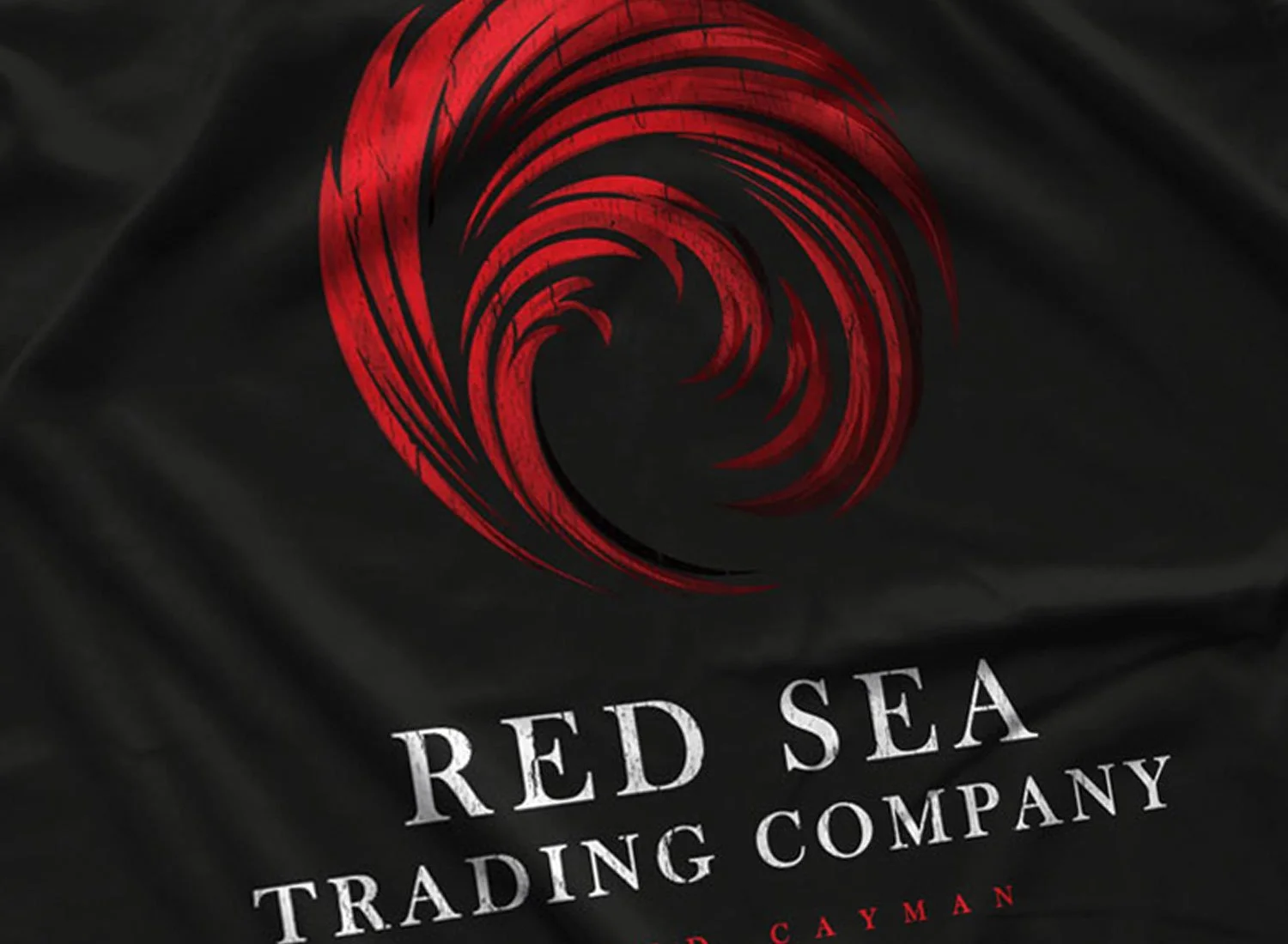 Close-up of a Red Sea Trading Company T-Shirt in Black. Get your "The Rock"- inspired shirt in sizes S to 5XL, starting at just $21.49 with free shipping.