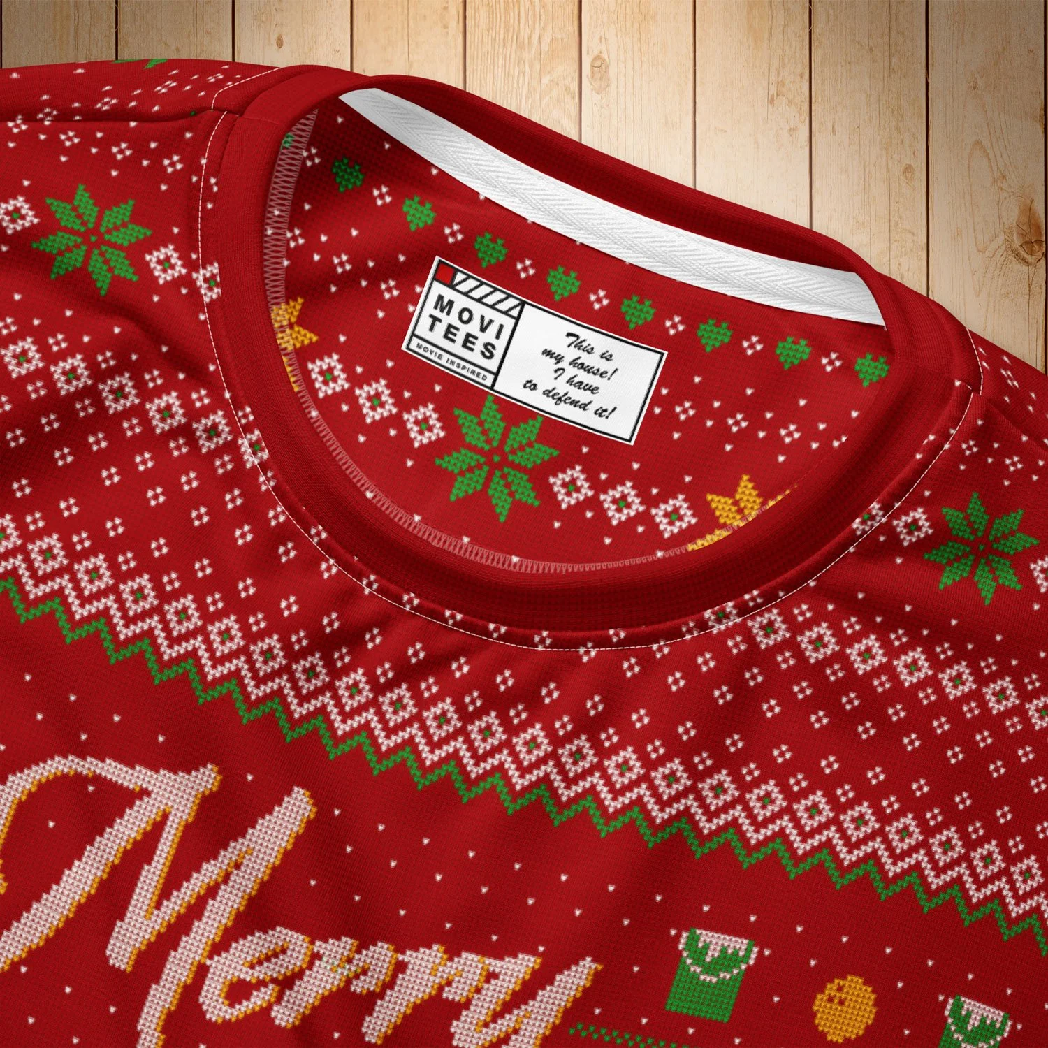 A close-up of a Merry Christmas Ya Filthy Animal Ugly Sweater Sweatshirt.
