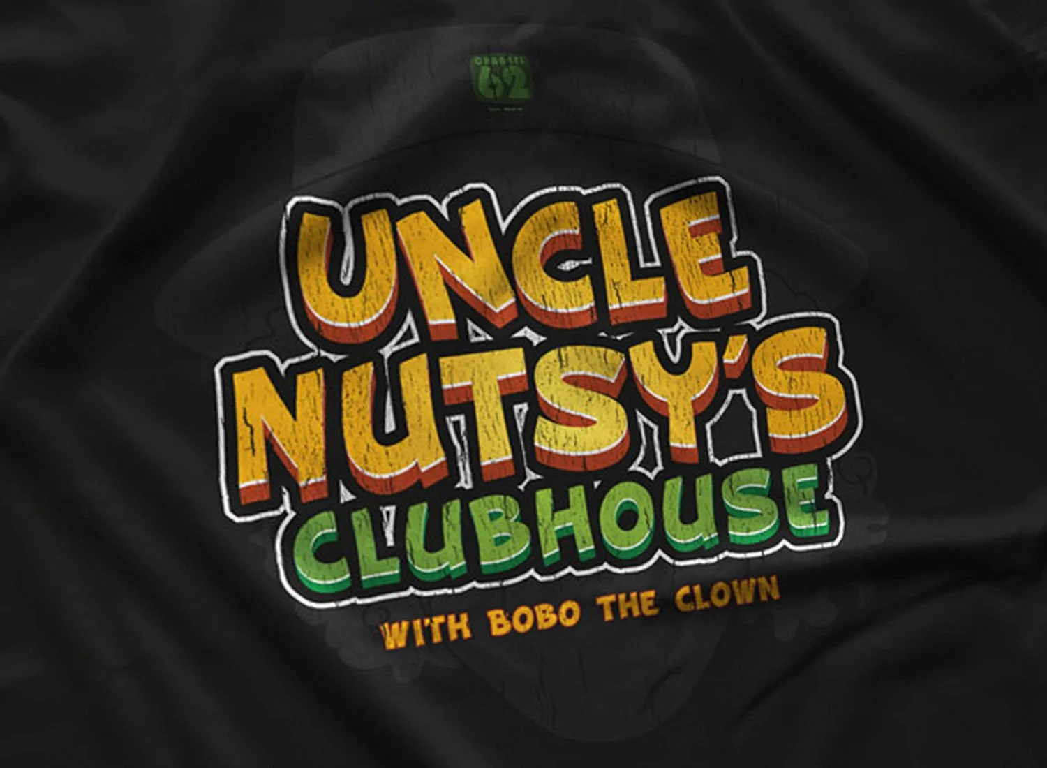 Close-up of a Uncle Nutsy's Clubhouse T-Shirt in Black.