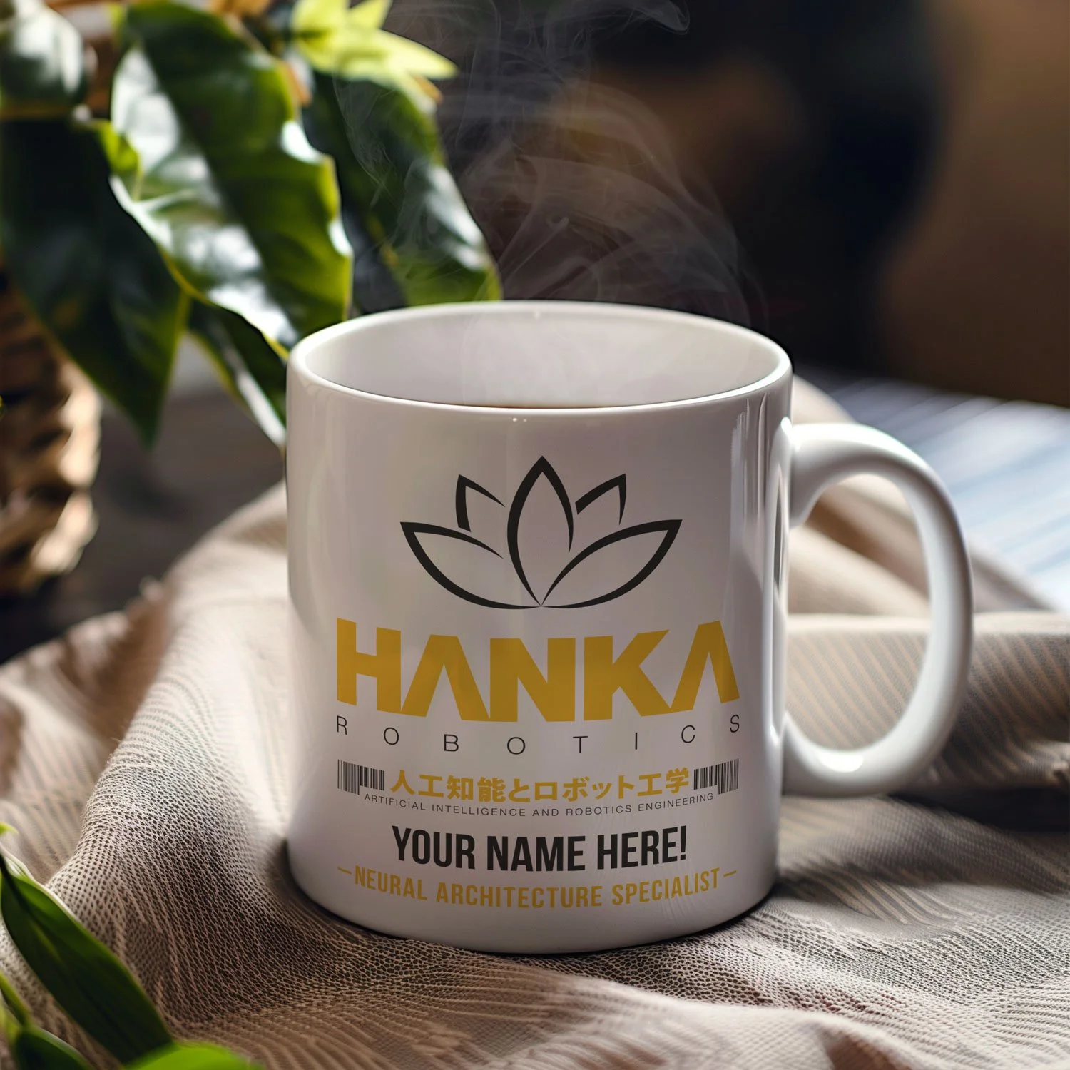 A personalized Hanka Robotics mug is displayed on a table, filled with coffee.