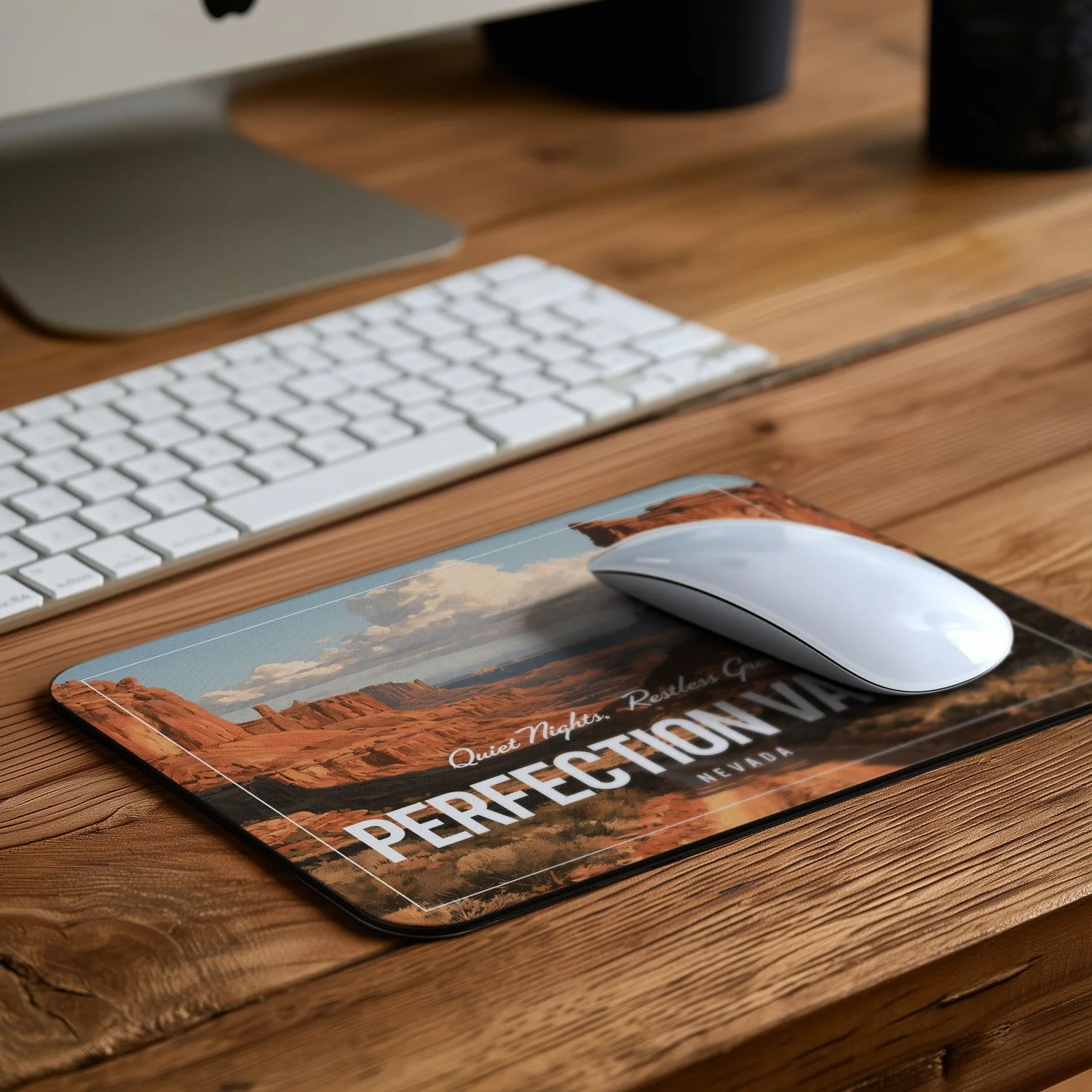 Perfection Valley - "Tremors" Inspired Mouse Pad is shown on a desk.