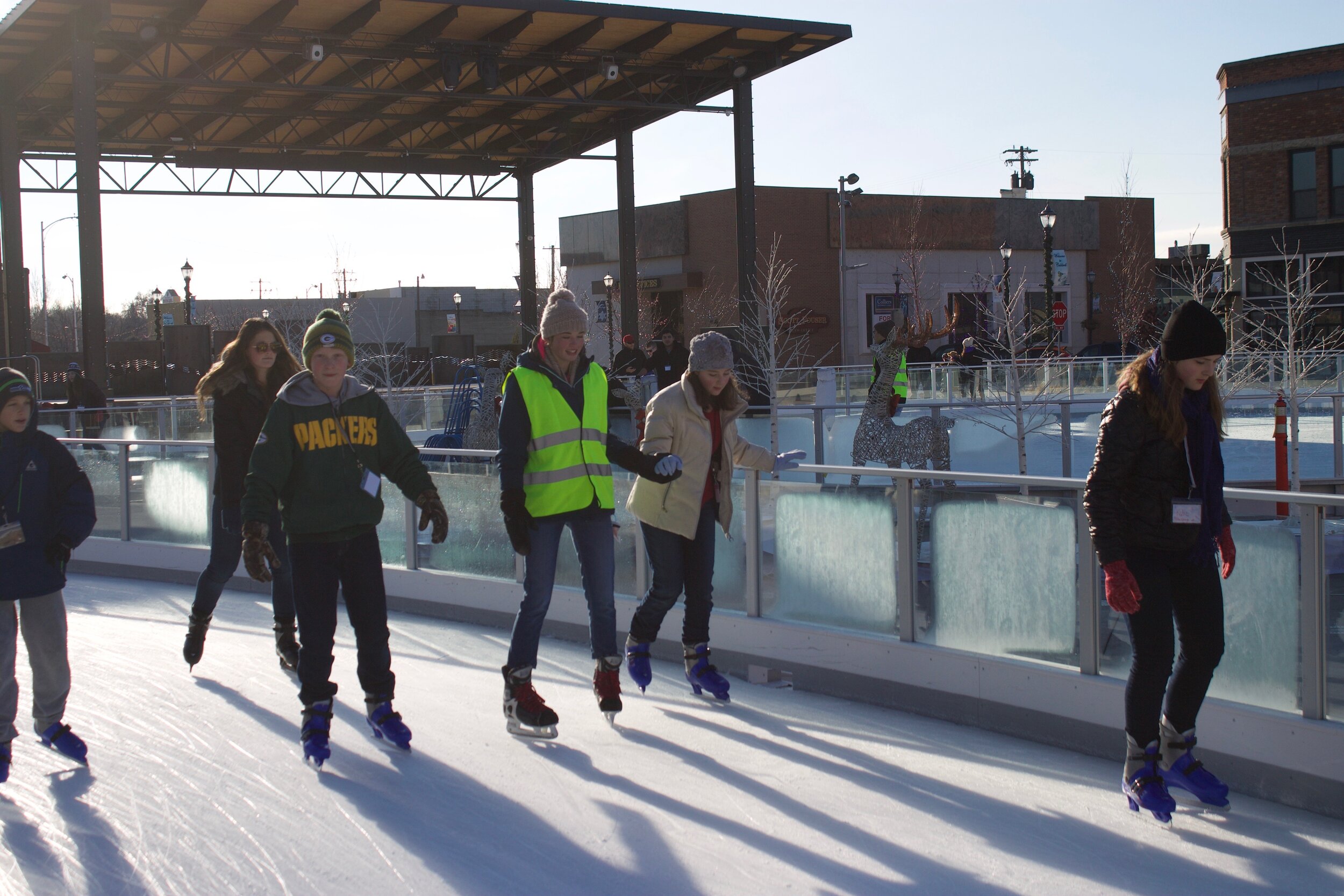 Volunteers offer additional support during free skate