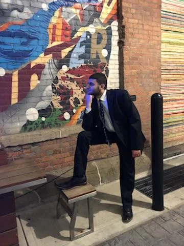 Company founder enjoying a nice mural