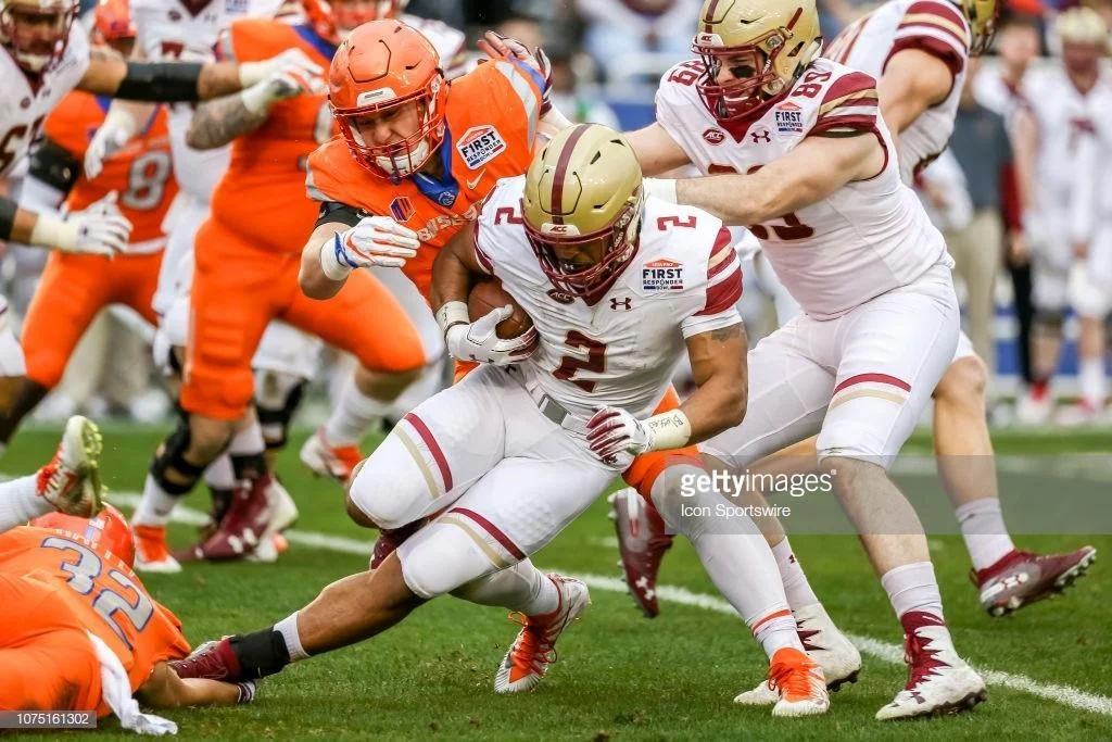 DALLAS, TX - DECEMBER 26: Boston College Eagles running back AJ Dillon (2) runs through the line of scrimmage during the game between the Boise State Broncos and the Boston College Eagles on December 26, 2018 at the First Responders Bowl in Dallas, …