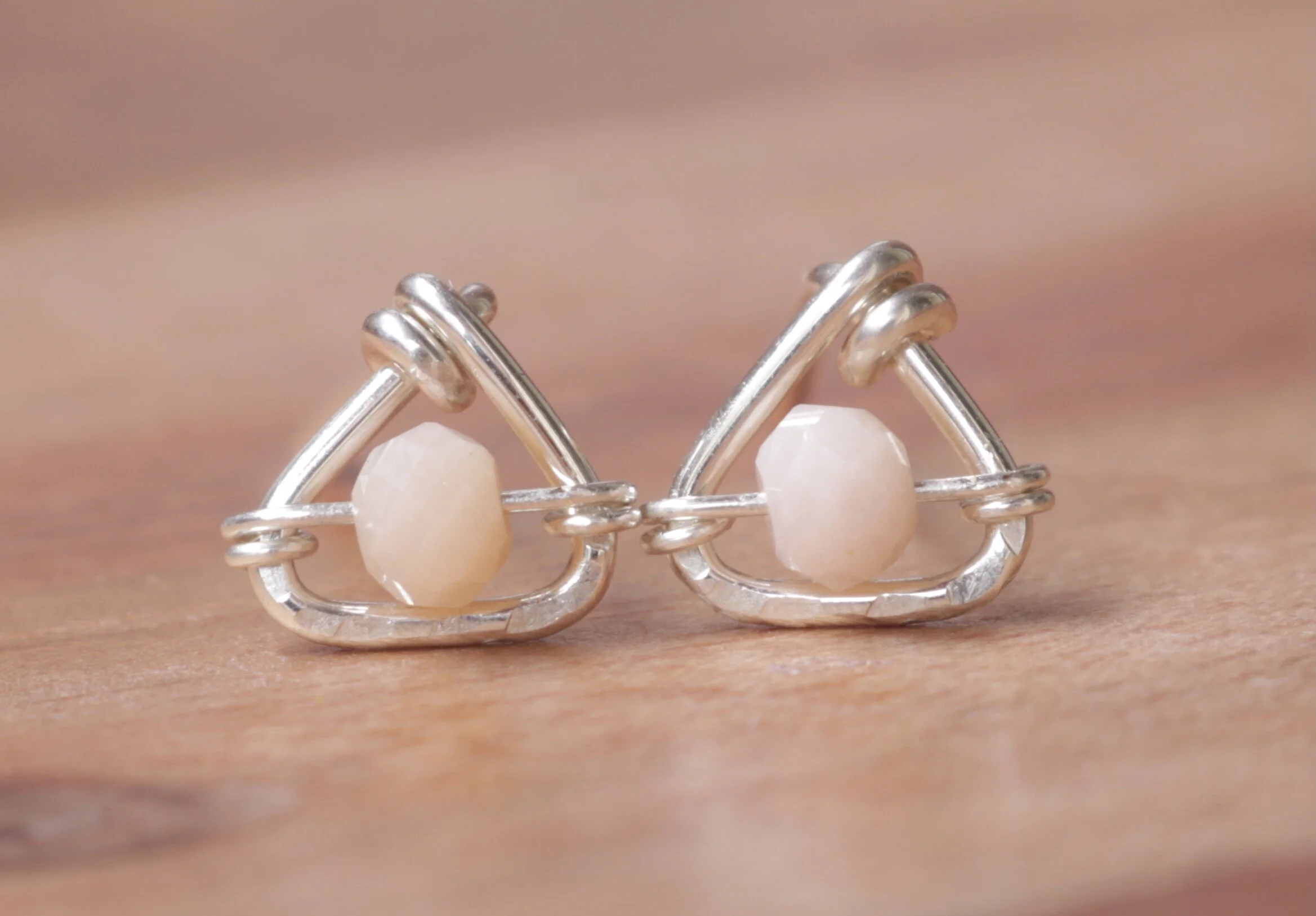 PINK OPAL STUDS PINK OPAL  A love stone, with a deep connection to the heart chakra. The stone of “resolution” as it works to heal emotional wounds and deep hidden fears allowing us to acknowledge and work with them and then let them go.L 0.6 mm x W…