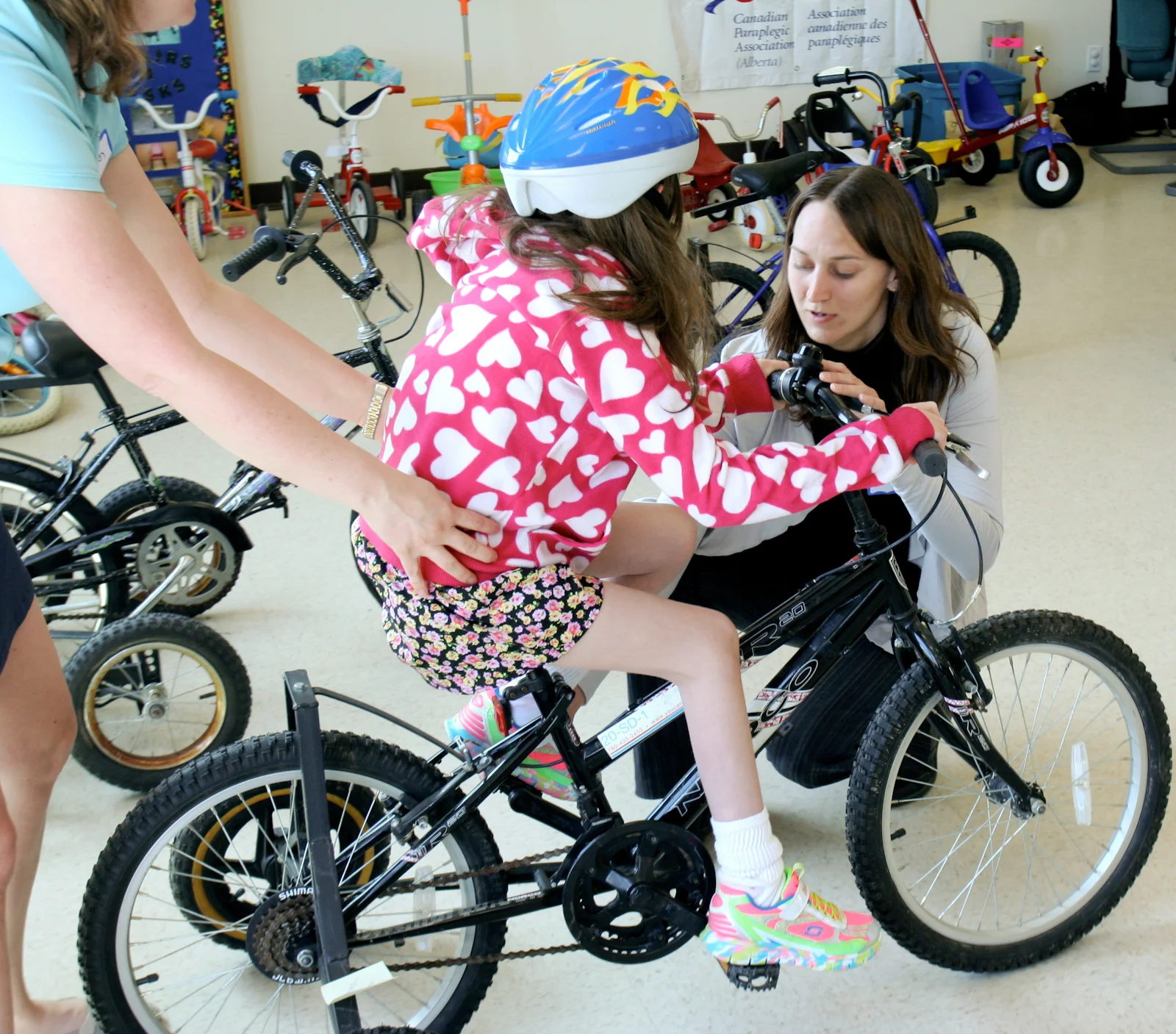 Help children with disabilities ride bikes Saturday, April 7, 2018