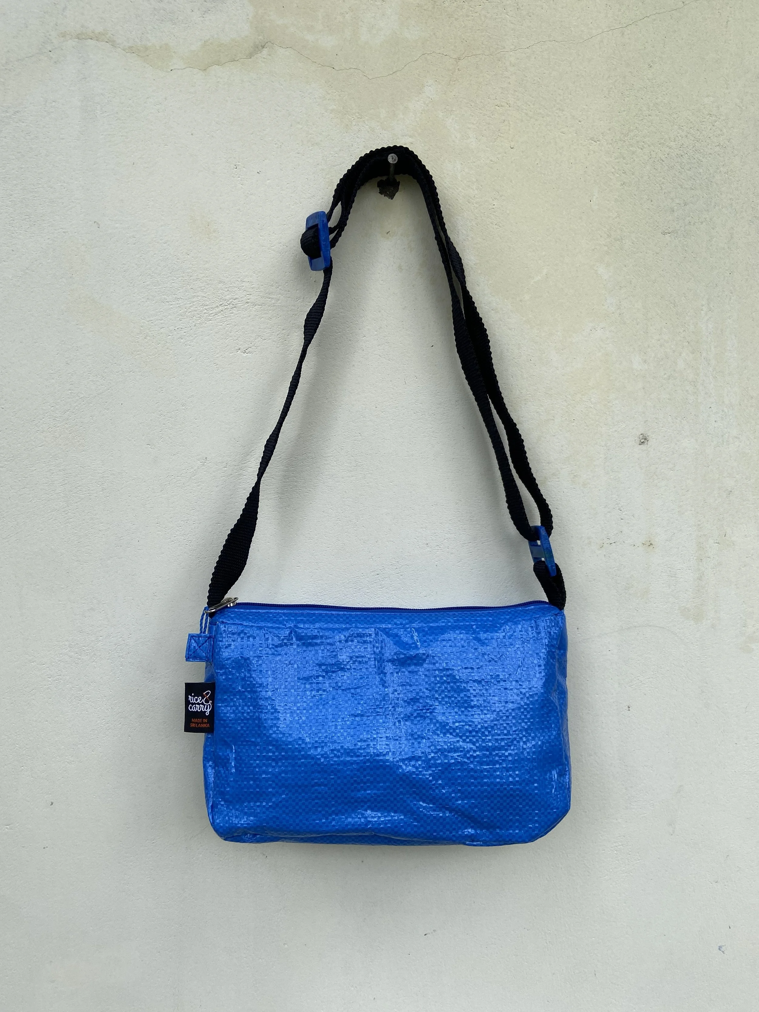 sling bag blue plain.jpeg