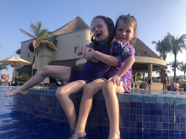 sisters at pool.jpg