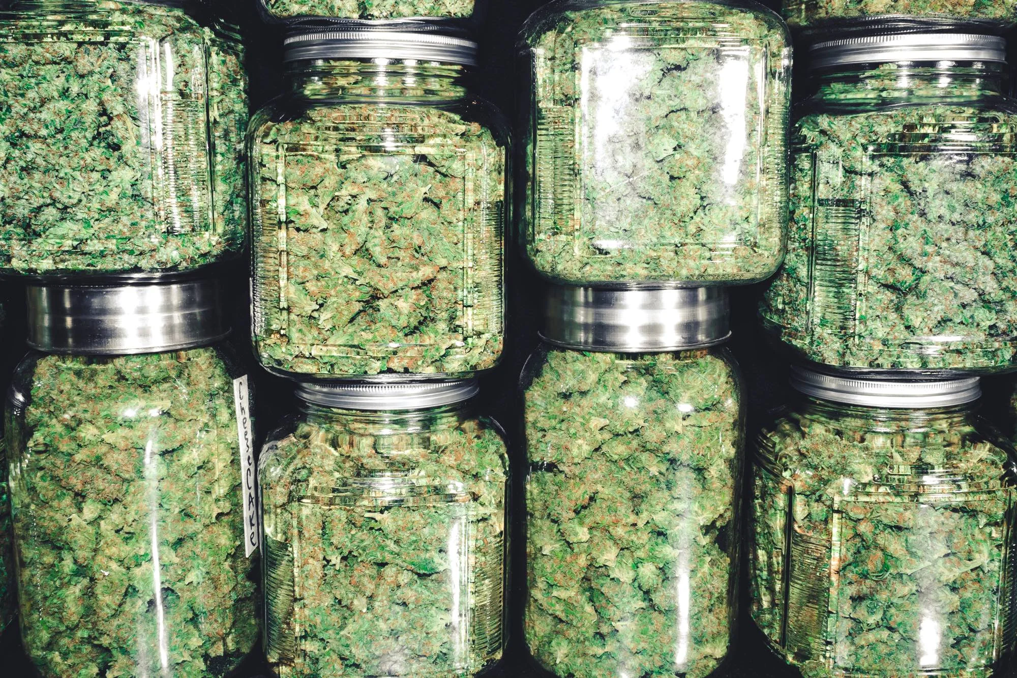 Marijuana Buds in Glass Jar Stack.jpg