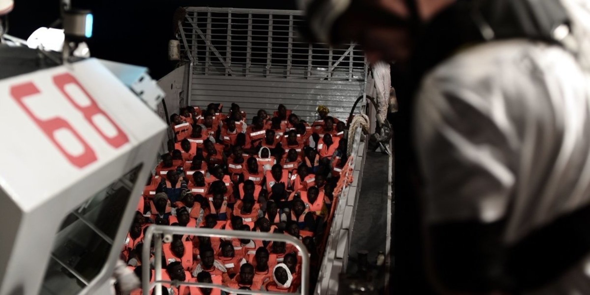 Hundreds of Rescued Migrants Begin Their Journey to Spain After Italy Refused To Take Them In