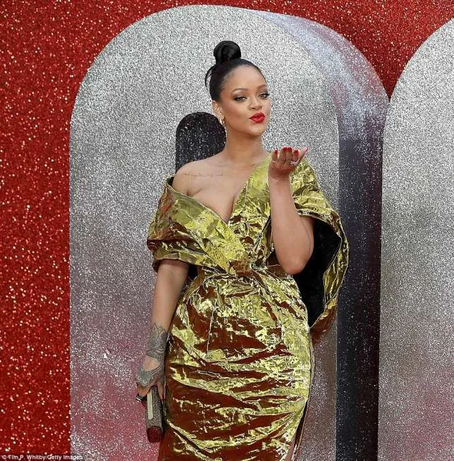 Popstar looks ravishing at Ocean's 8 premiere in gold Poiret dress