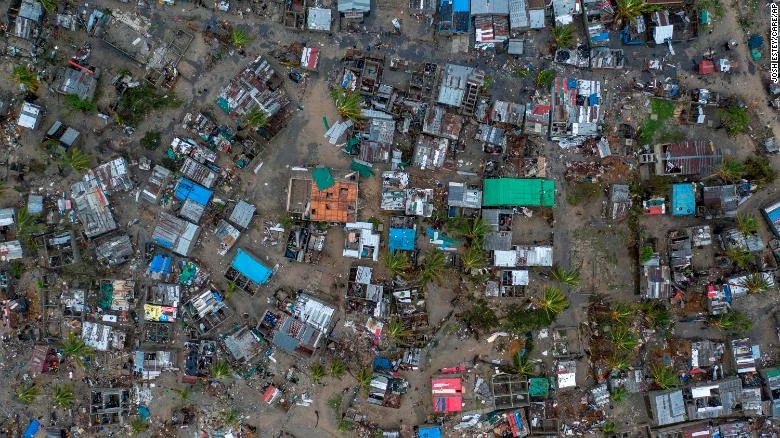 Cyclone survivors clinging to rooftops in Mozambique as they await rescue, aid officials say