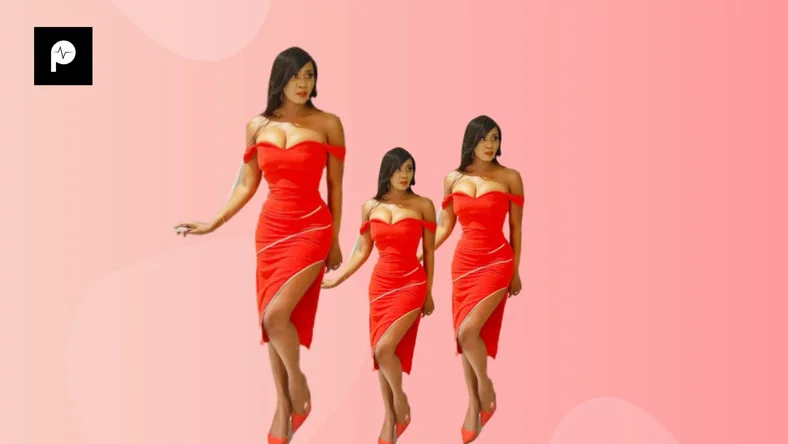 Toni Tones gives us Jessica Rabbit vibes in a red Jewel by Jemila cocktail dress