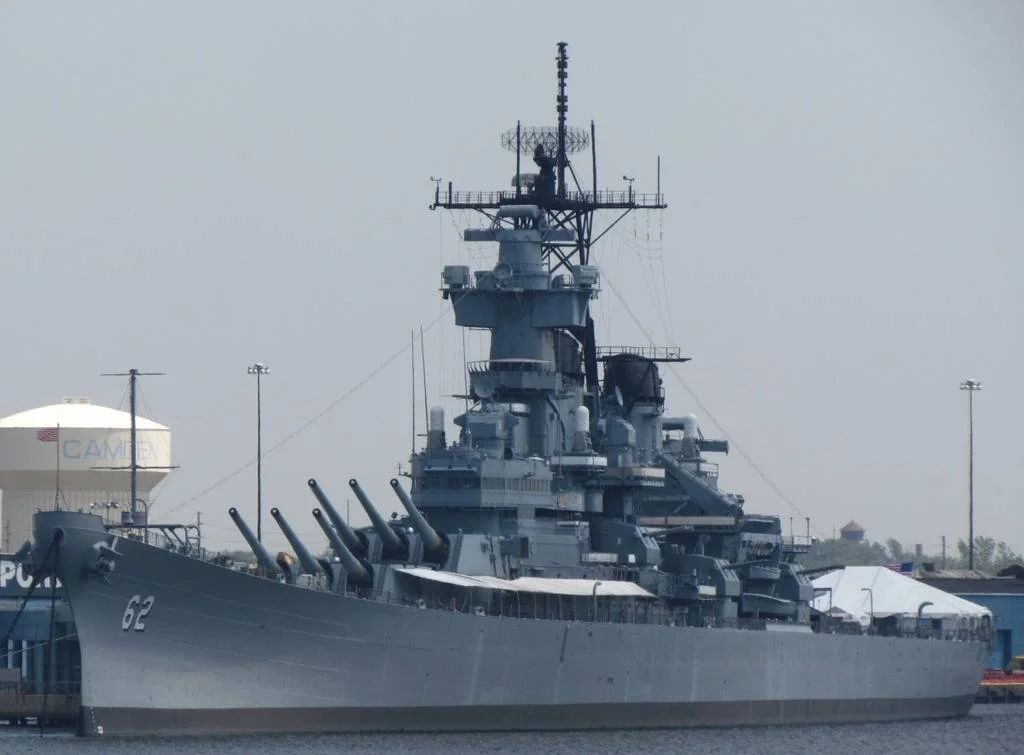 Battleship on the Delaware River: USS New Jersey traveling to Philadelphia for repairs