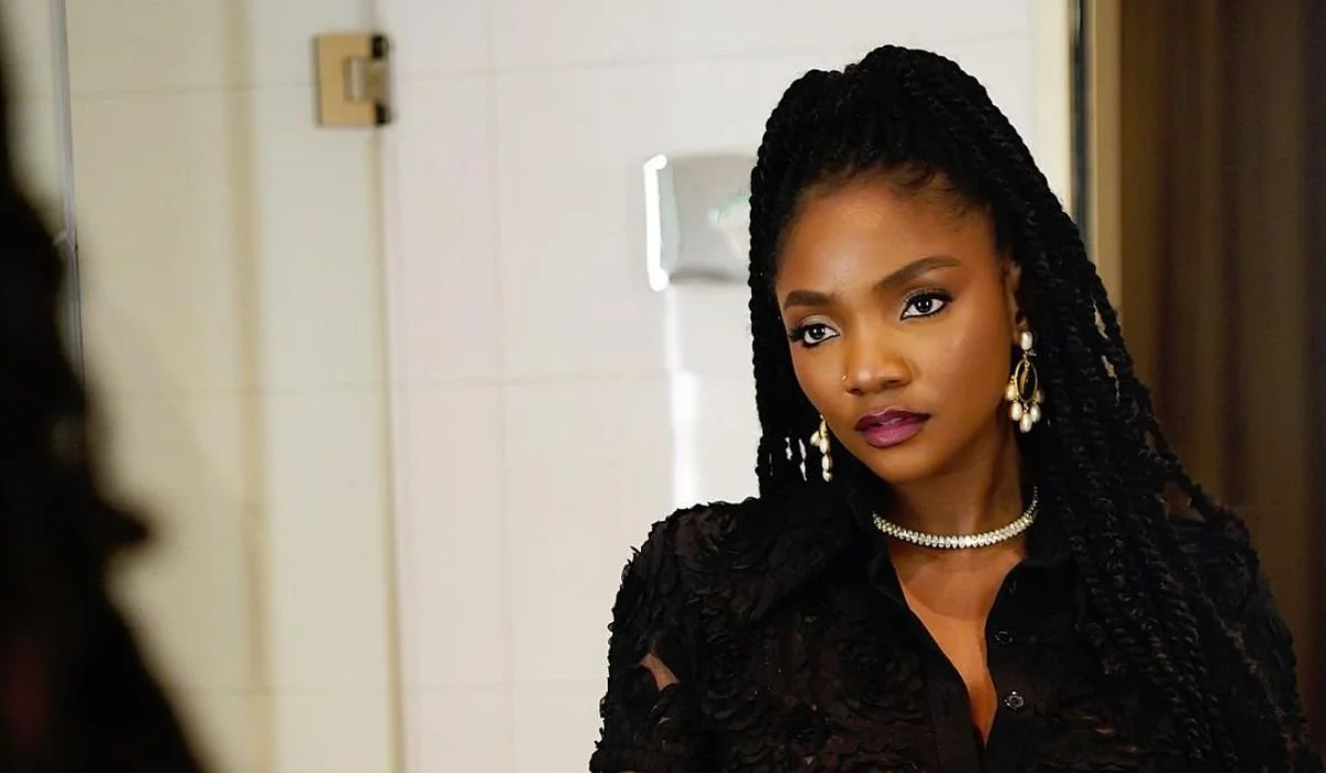 Simi says she only listens to Adekunle Gold's music because they are married