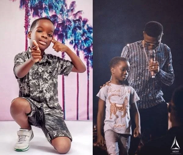 Wizkid’s Son, Bolu Spotted With Jamaican Singer, Popcaan In London