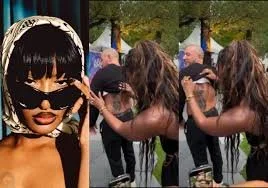 Singer, Tems Meets Male Fan Who Tattooed Her Face On His Back.