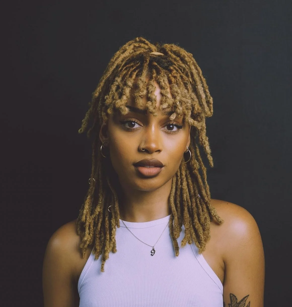 A Guide to the Different Stages of Locs