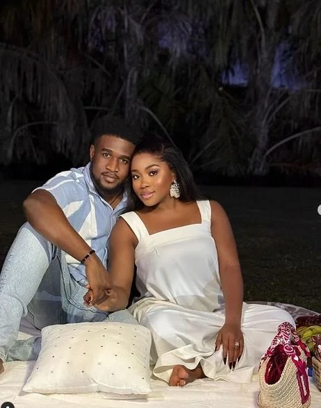 Veekee James writes, "Love is indeed beautiful," as she enjoys a picnic with her husband.