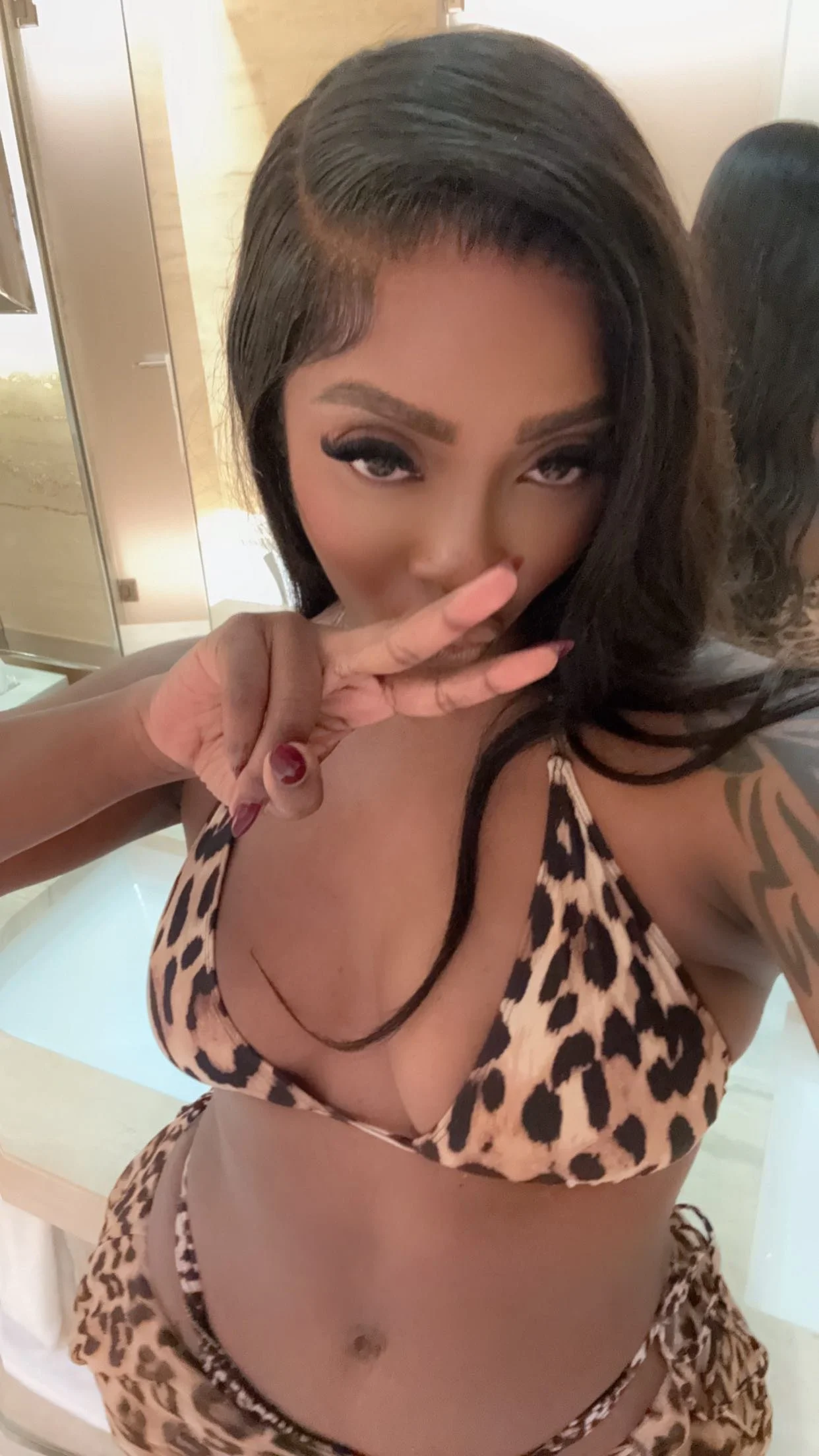 Tiwa Savage appears as a big spender in the "Mega Money Mega" video.