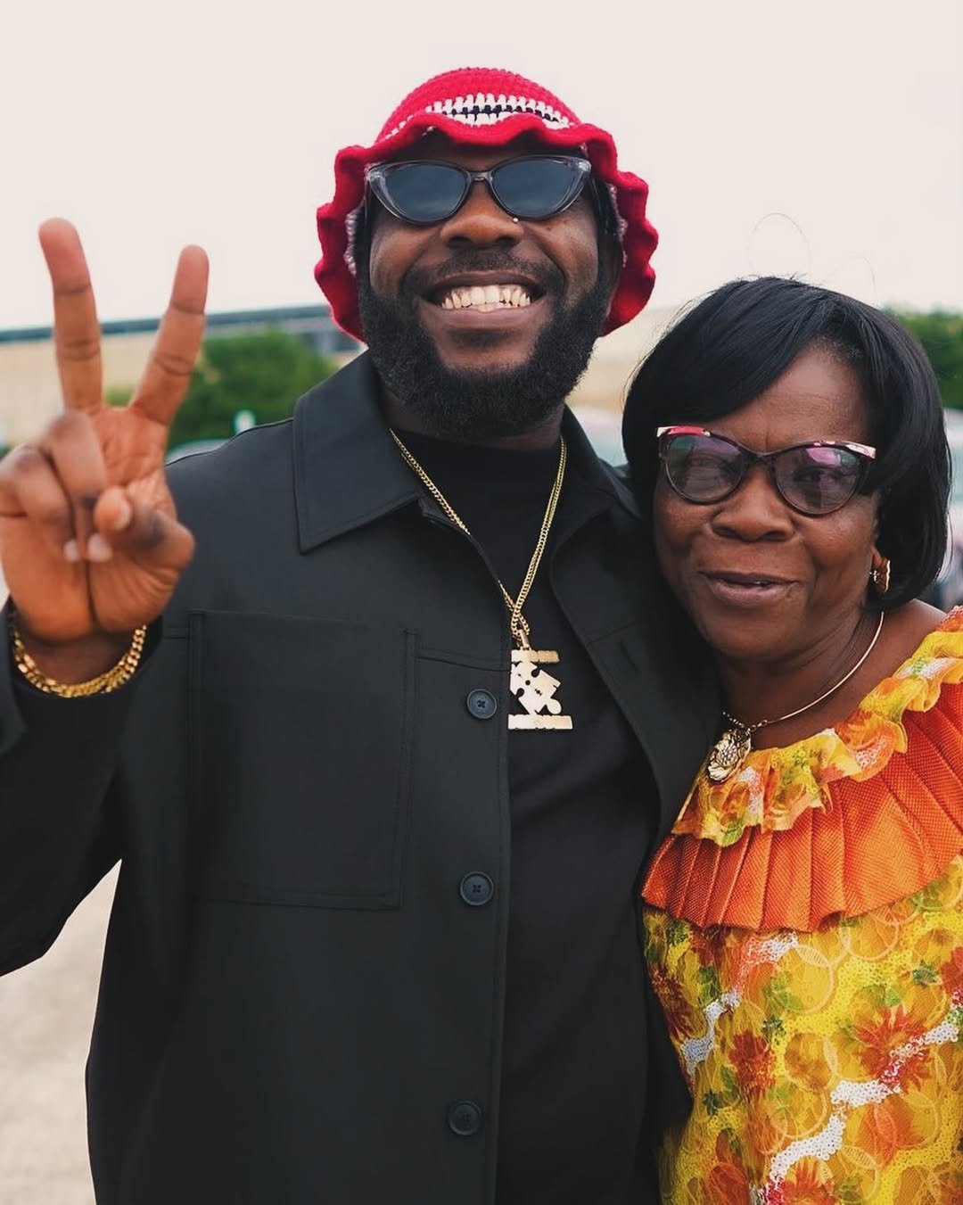  Odumodublvck Shares Heartwarming Moment: Mother Anoints Team Before School Tour
