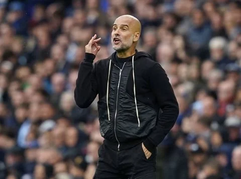 Guardiola Sends Warning as Man City Close Gap on Arsenal