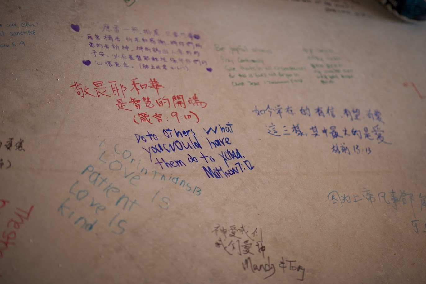 Bible verses written by St. E parishioners on the floor of the main sanctuary during construction