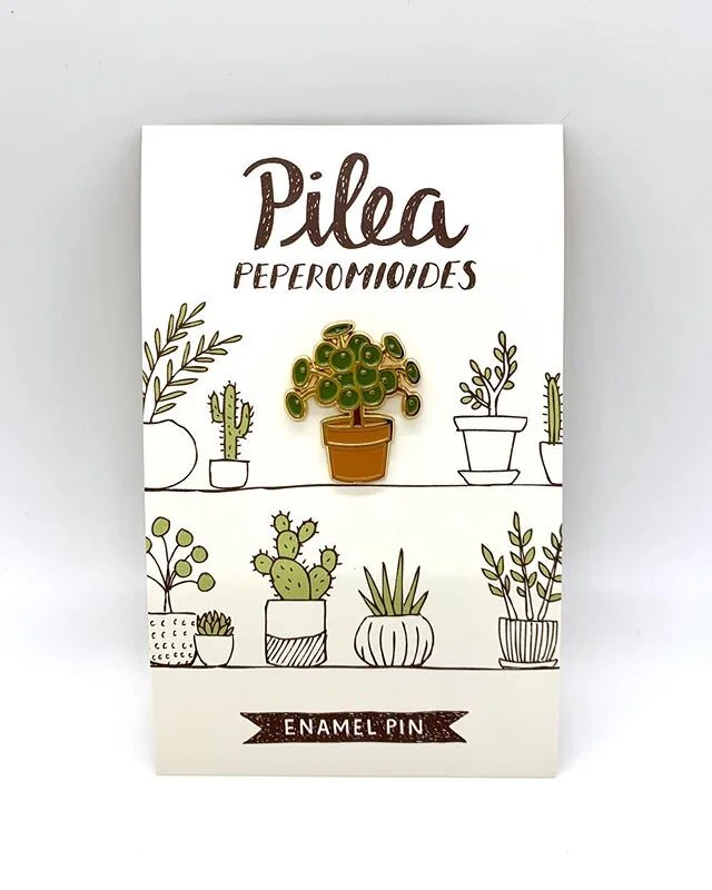 We&rsquo;re so excited to finally share (&amp; expand!) our line to include the cutest plant-parent inspired pins. This lovely Pilea is dropping on the shop tomorrow with a few other new favs! 🥰🌿 Stay tuned for some more fun stuff #MahinanRoux