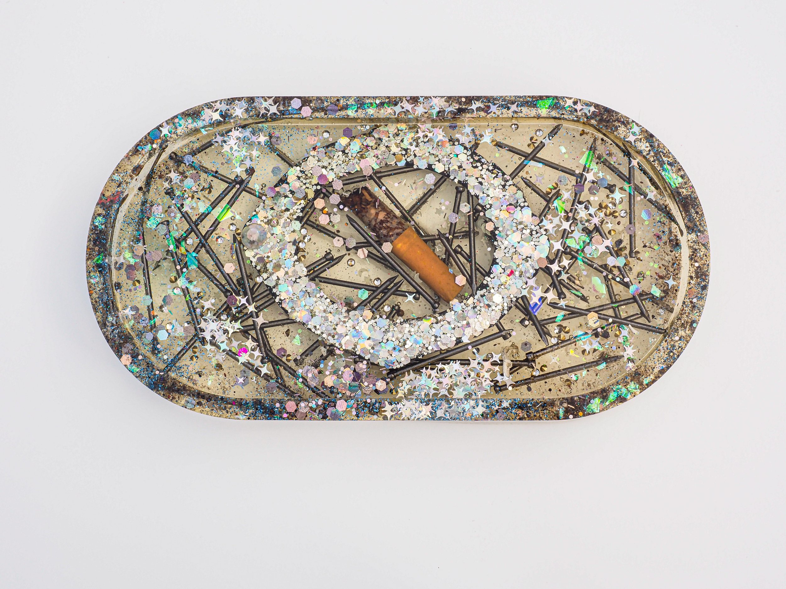 oval dish with cig glitter nails frame.jpg