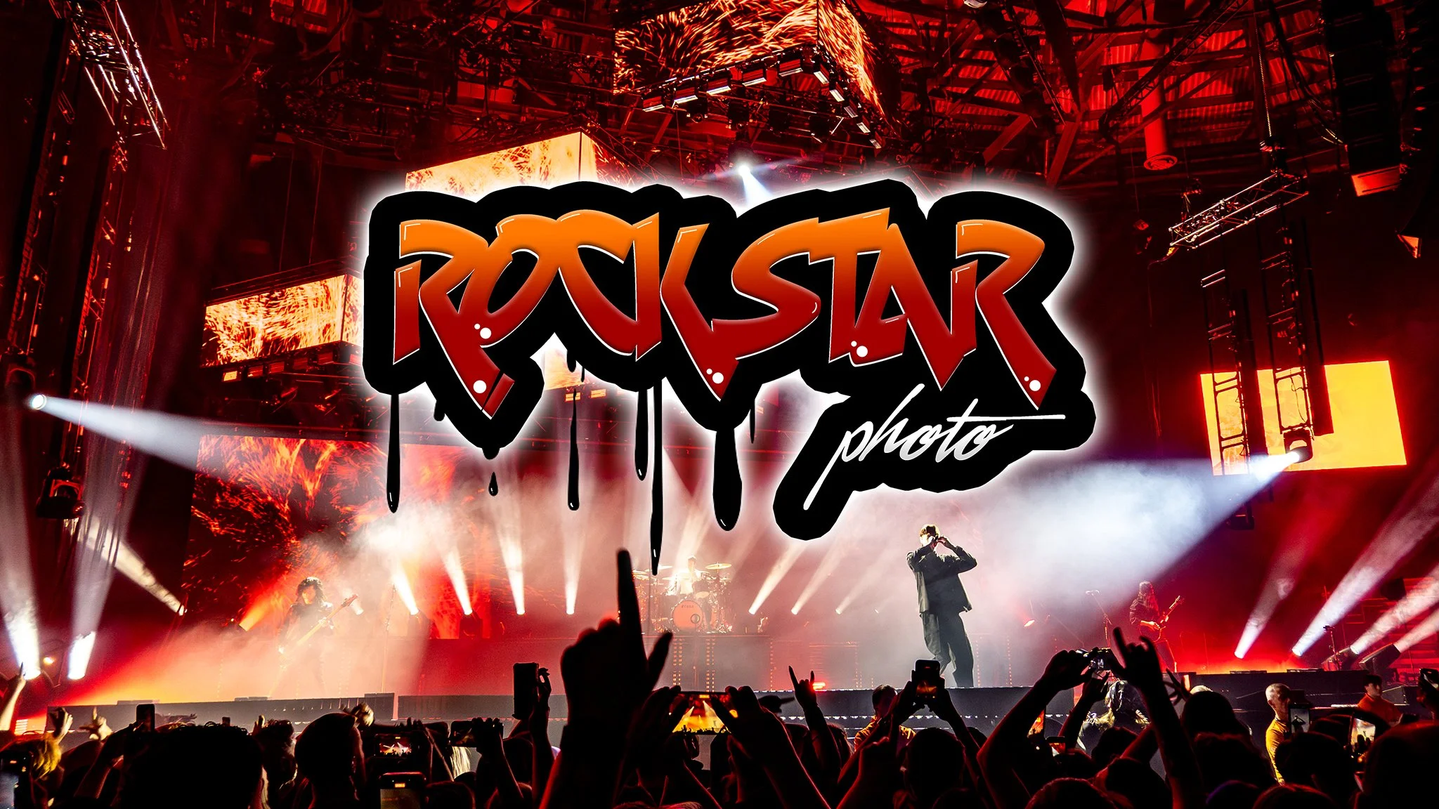 Live rock concert photography – energetic band performing under dramatic stage lights with cheering crowd and spotlights. Music gig & band photographer Nottingham & UK - Rockstar Photo