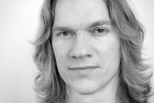 headshot_bw_DanShepherd_sq-6691-374x251.jpg