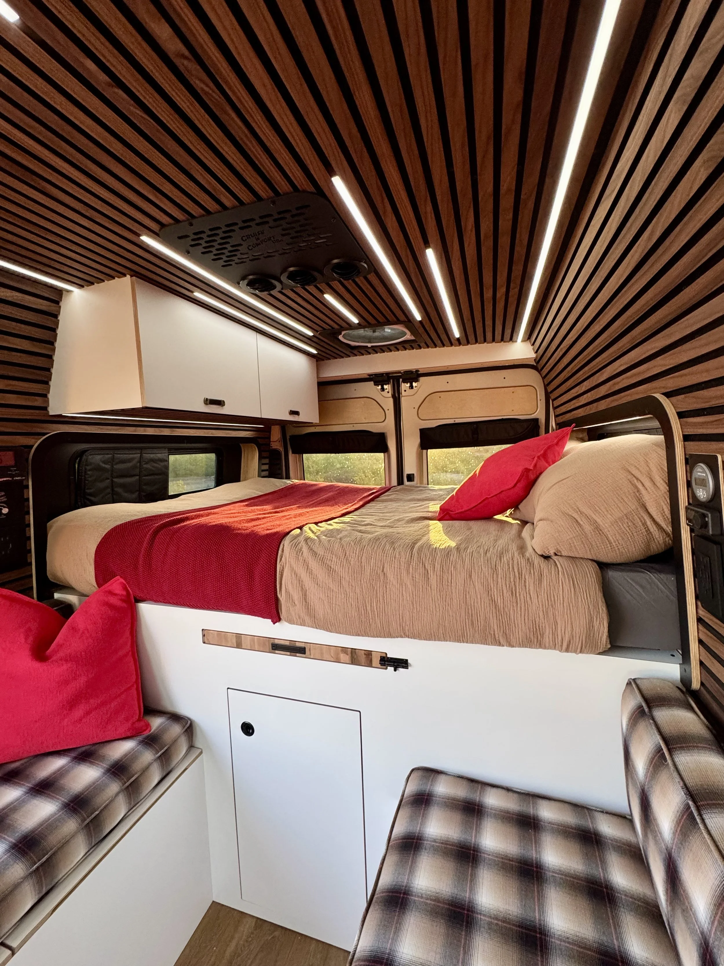 guthrie-boho-camper-van-rental-bed.jpeg