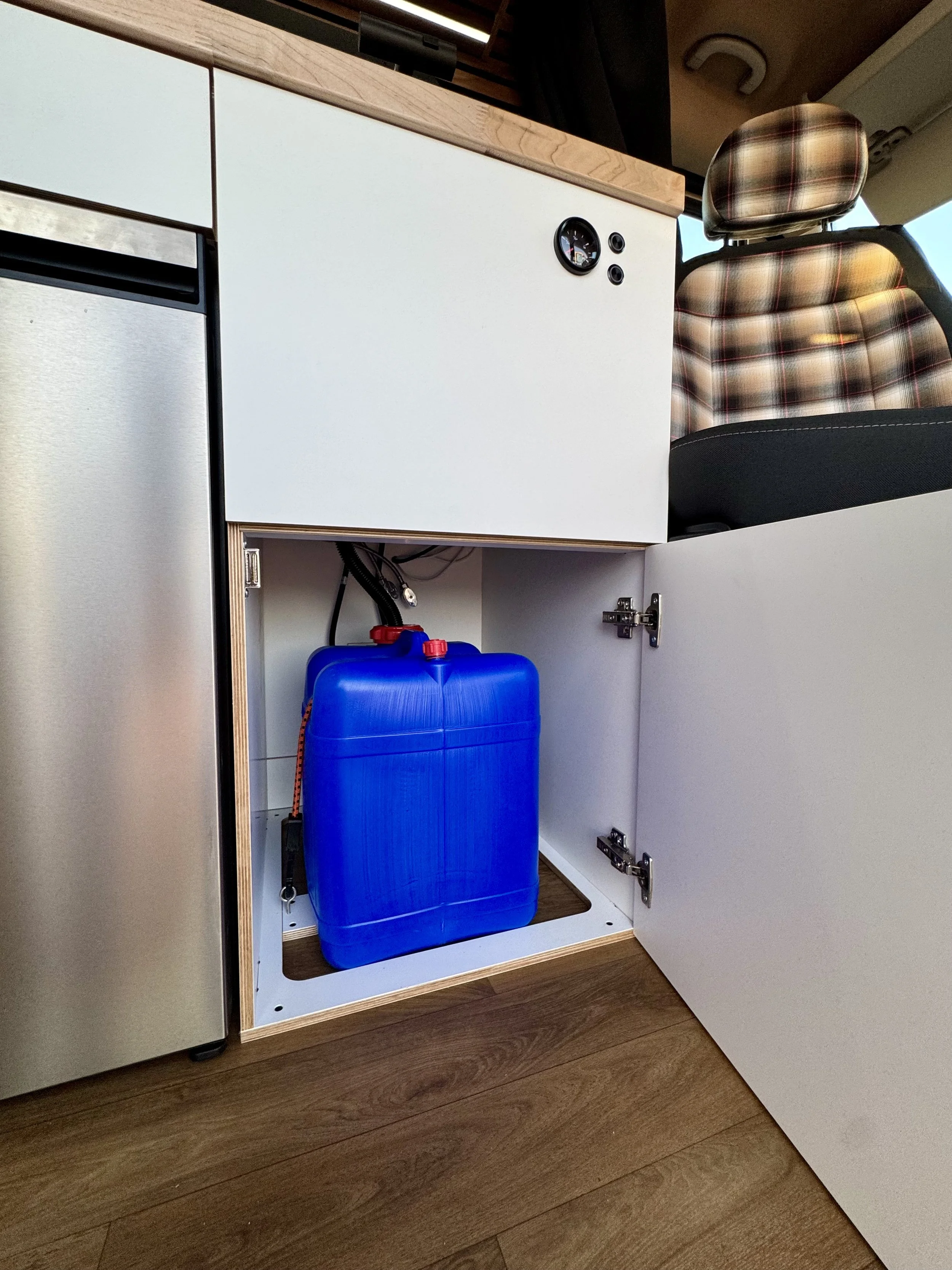 guthrie-boho-camper-van-rental-gray-water.jpeg