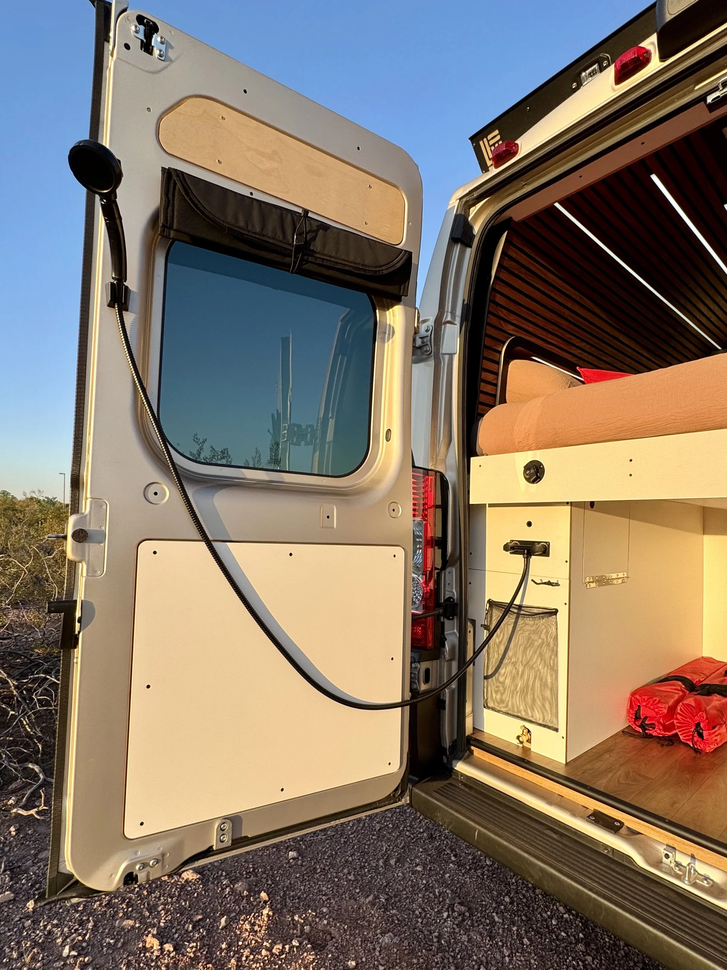 guthrie-boho-camper-van-rental-outdoor-shower.jpeg
