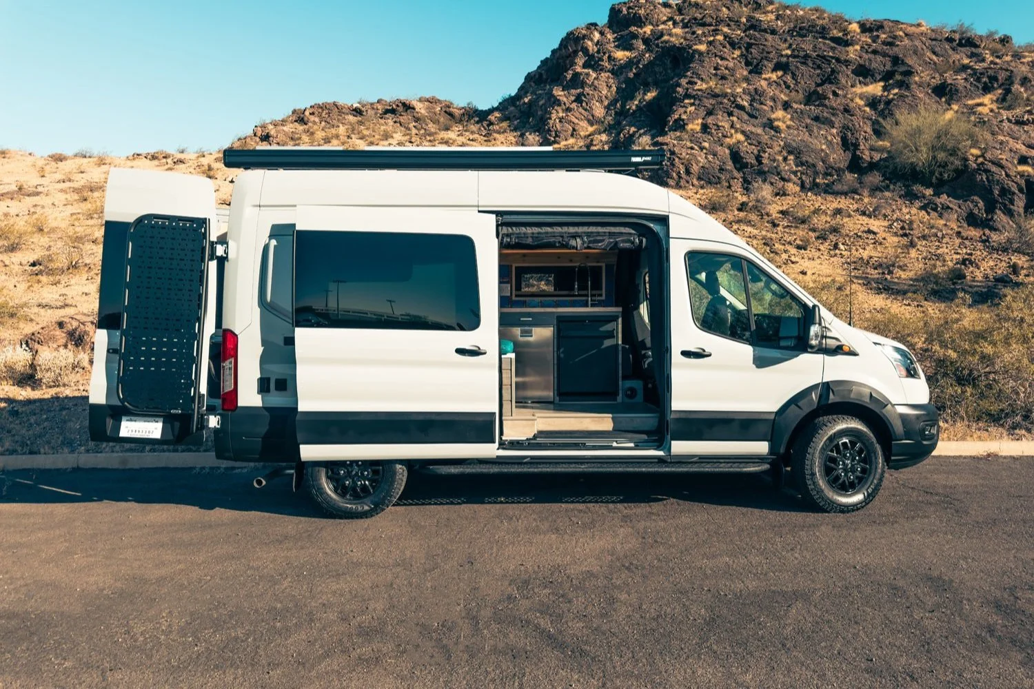 2-boho-camper-vans-ford-transit-train-mjolnir.jpg
