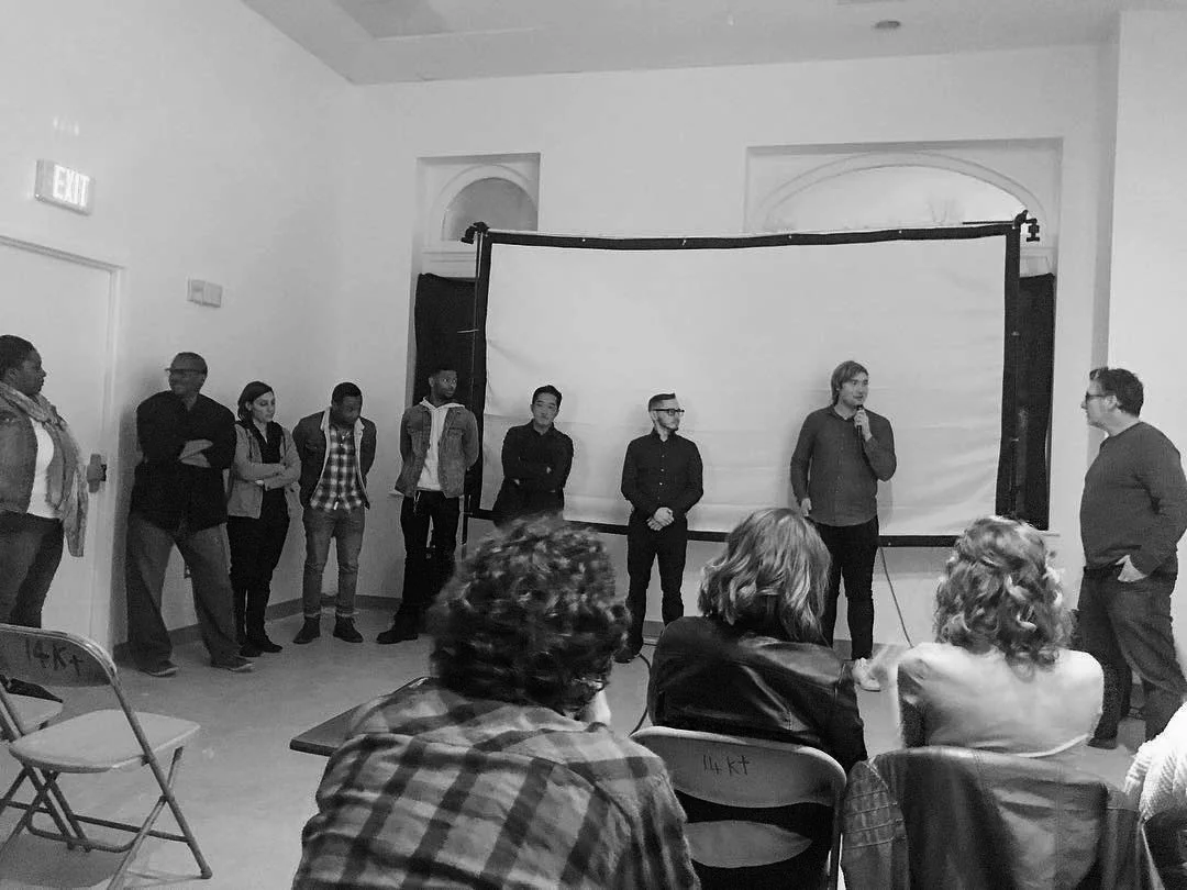 Filmmakers from left to right: Nicole Powell, Eric Cotten, Dina Fiasconaro, Harold Young, Wenston Black, Andrew Nguyen, Daniel Supanick, and Ryan McGlade on the mic. Host, Miceal O’Donnell, stands to the right. Photo courtesy of Leesa Ashley.