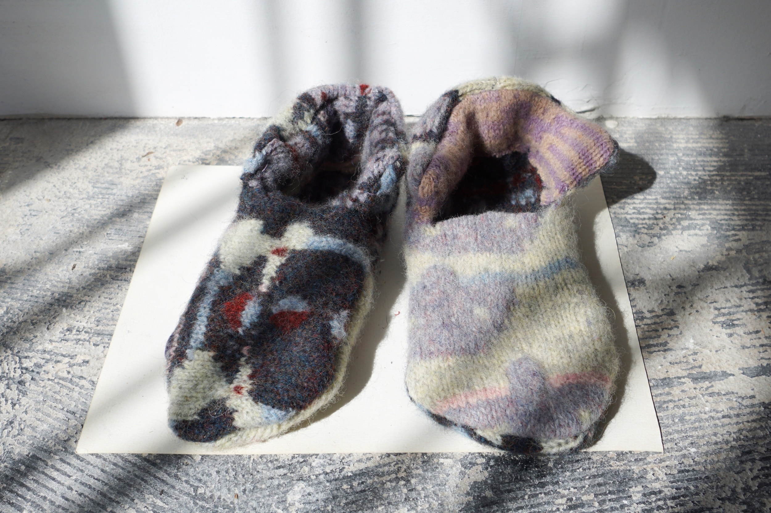  Johanna Jackson  Three Pairs of Slippers , 2018 Felt 9.5 x 9.5 x 3 inches each 