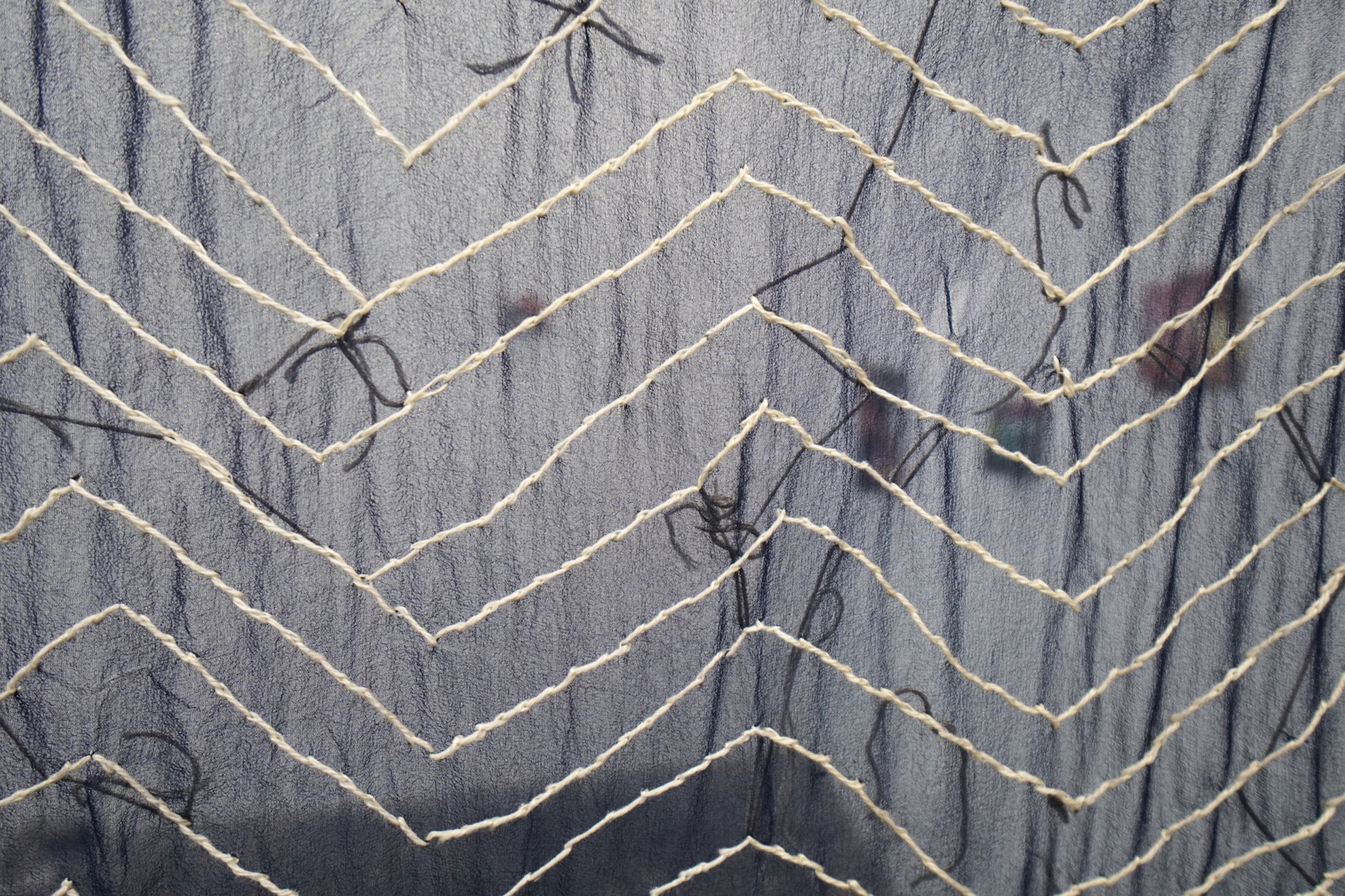  Morgan Ritter  The sea is dimensional yet without surfaces (with Walking Ropes) , 2018 (detail) Moving blanket, silk, alpaca, and acrylic thread, broomstick 82 x 71 inches 