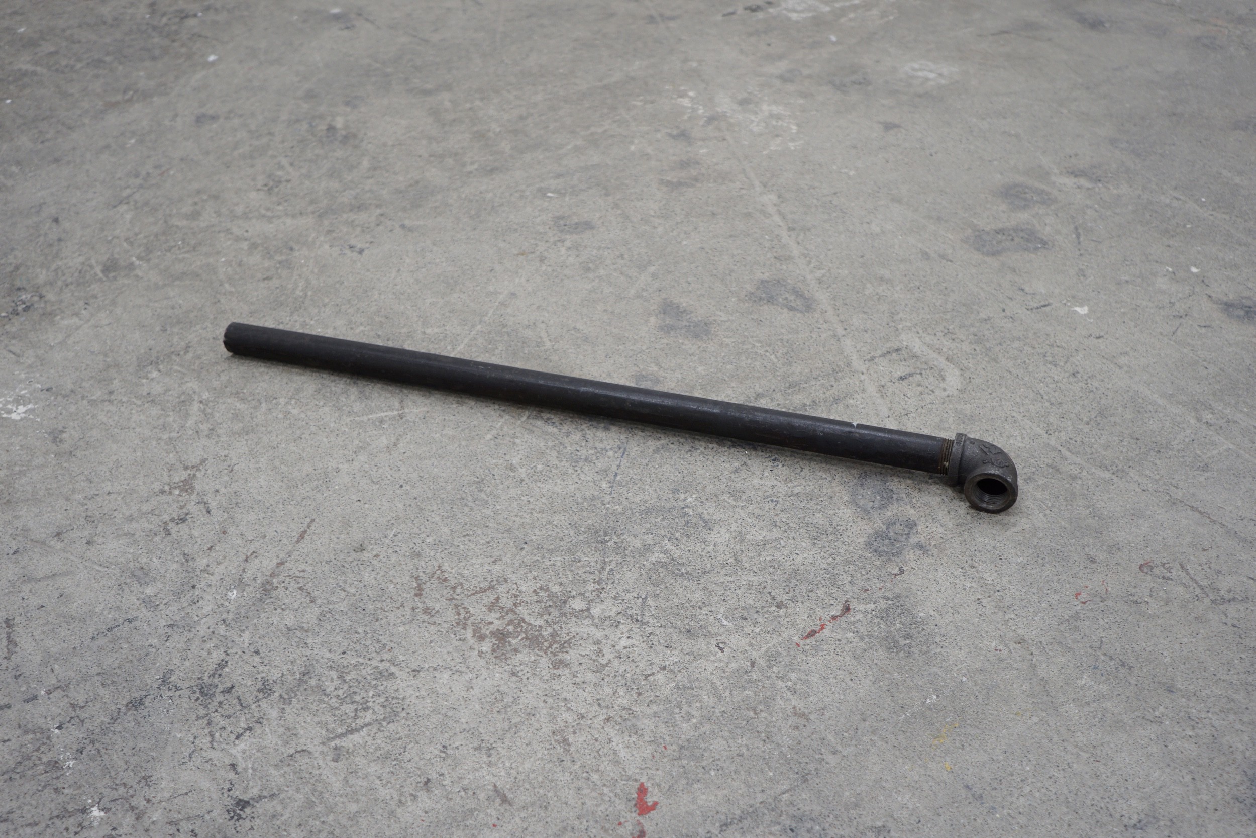  Anthony Discenza  Untitled (Pipe) , 2017 Cast iron pipe with elbow fitting used in production of 2010 film  The Experiment   